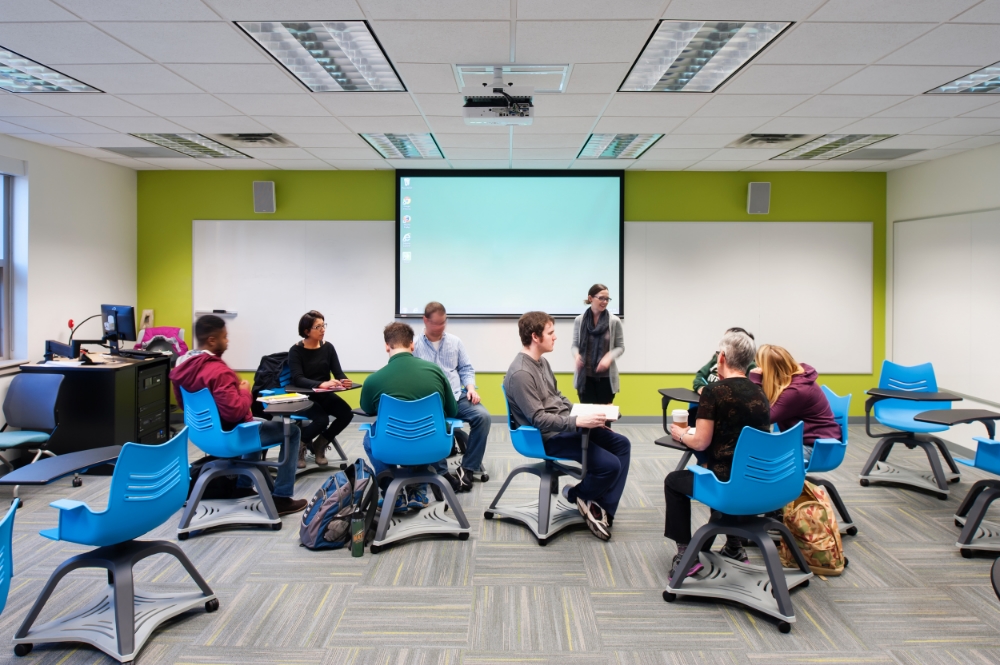 Bold color animates the refurbished classrooms which are furnished with rapidly reconfigurable furniture groupings.