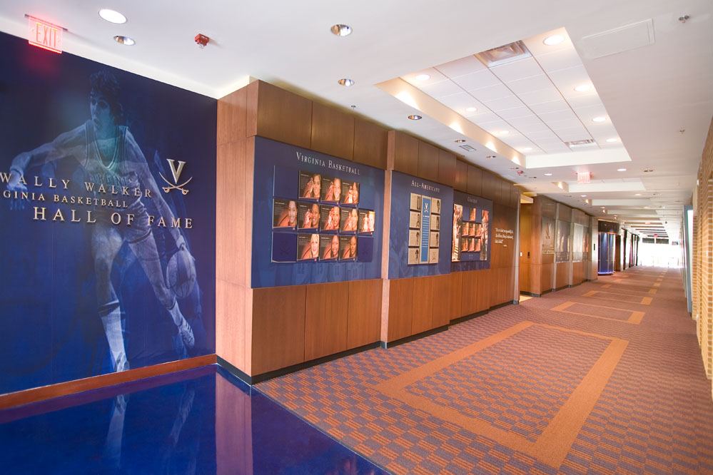 Duotone graphics and stained concrete floors welcome visitors to UVa's Sports Hall of Fame. 