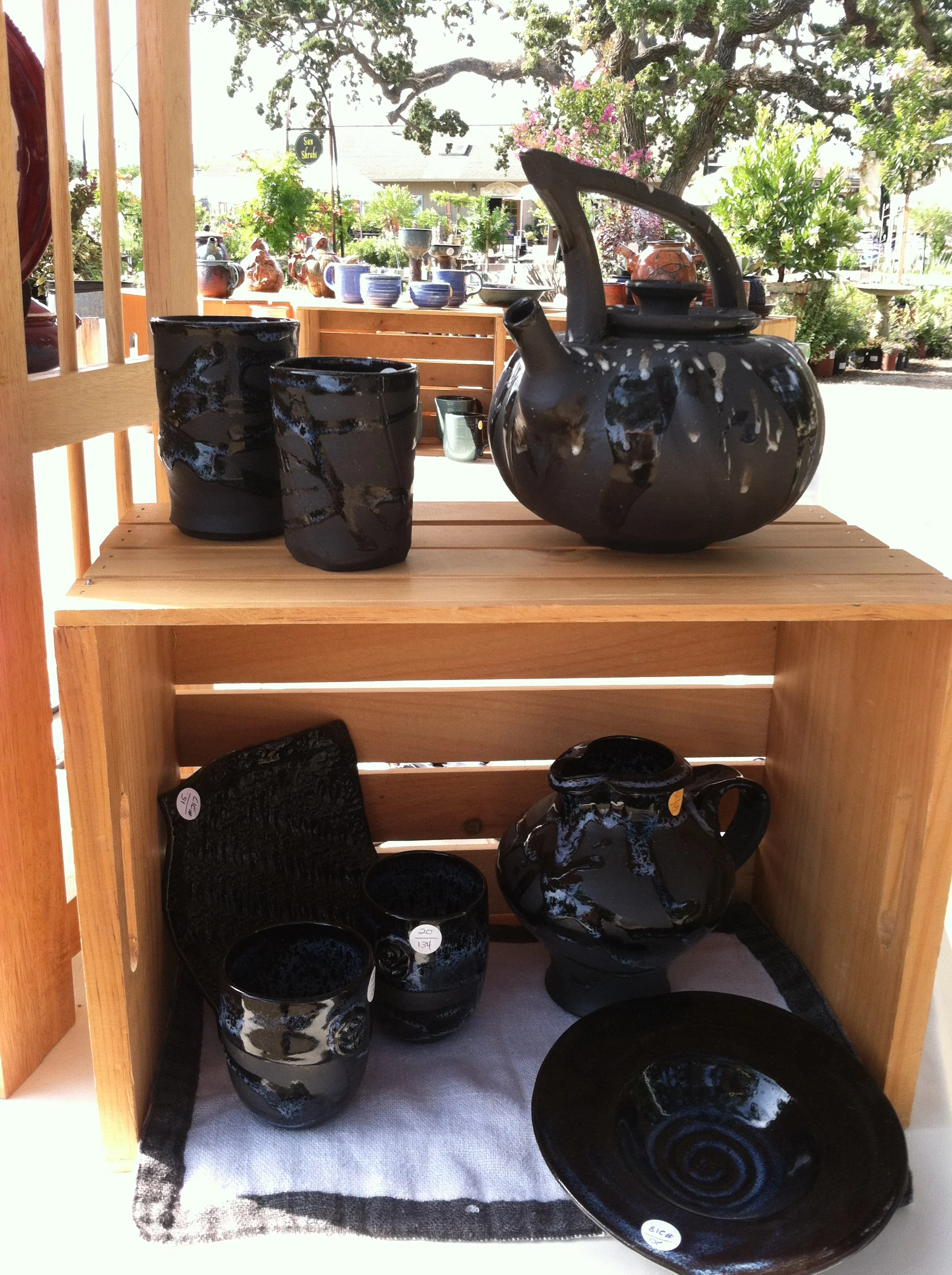Teapots, Plates and Cups on Crates