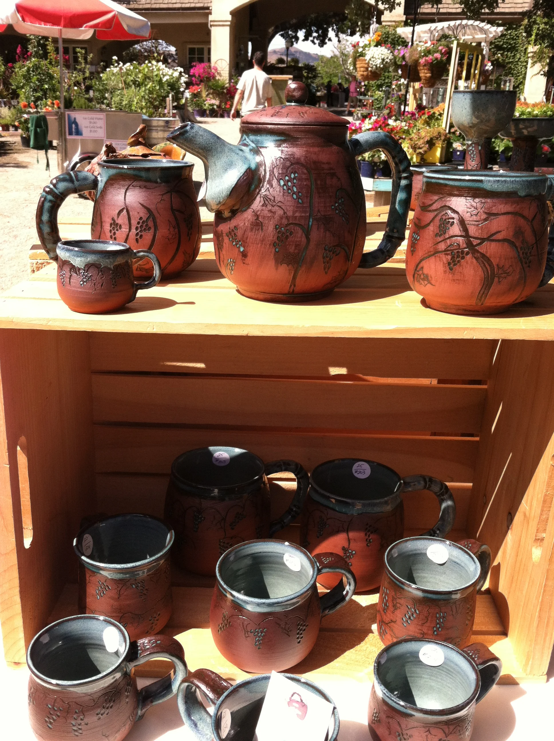 Teapots and Cups on a Crate