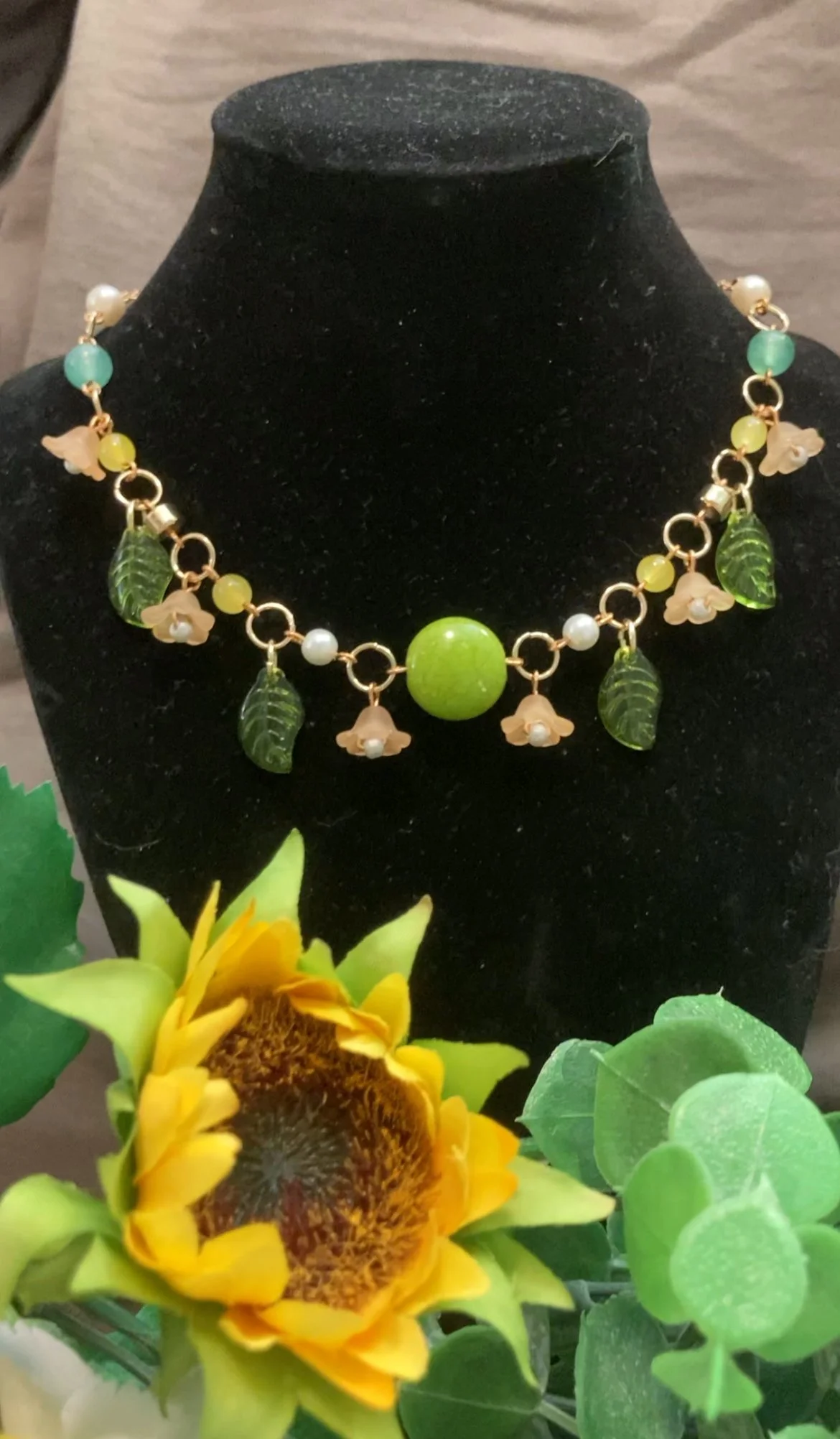 green necklace w flowers and leaves.jpg