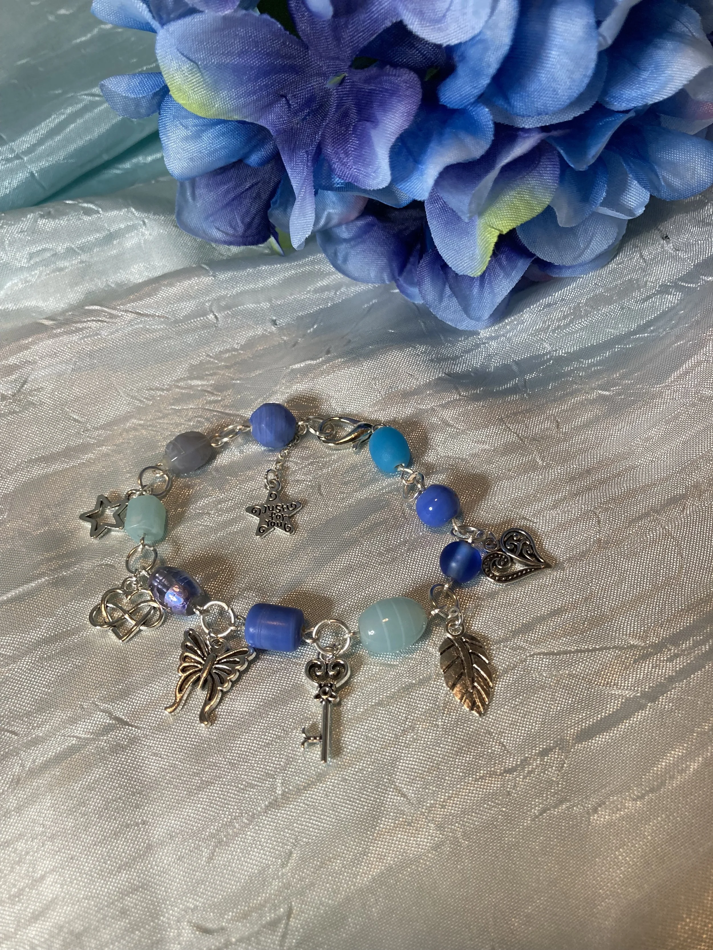 blue charm bracelet .jpg