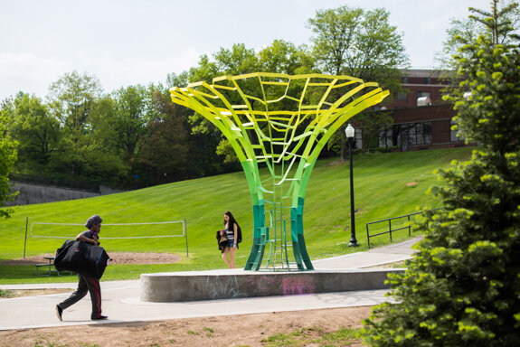  Calyx, a recently-installed, computer-generated welded steel sculpture designed by Turkish artist Sabri Gokmen, that celebrates technology, nature and knowledge, is pictured outside University of Rochester's Sage Art Center May 18, 2015.  // photo b