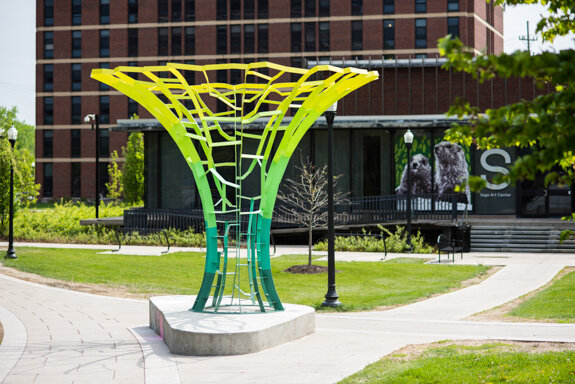  Calyx, a recently-installed, computer-generated welded steel sculpture designed by Turkish artist Sabri Gokmen, that celebrates technology, nature and knowledge, is pictured outside University of Rochester's Sage Art Center May 18, 2015.  // photo b