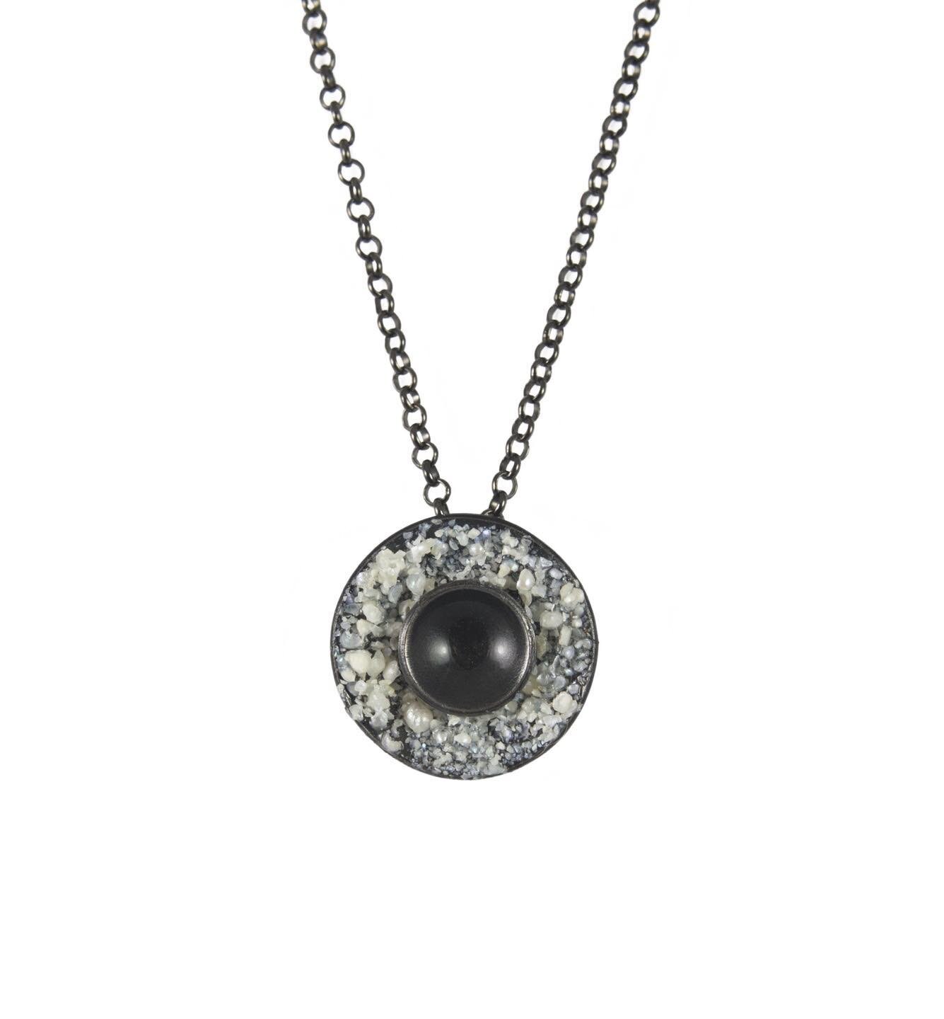 Empty Cup &amp; Saucer. 🖤
Mild steel, crushed pearl and a sterling silver chain. Available on my website!
-
-
-

#instajewelry #handmadejewlery #handmadecrafts #bespokejewelry #mainemade #madeinmaine #shopsmall #shoplocal #femalemade #womenwhocreate