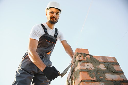 Long Branch fireplace service employee at work.jpg