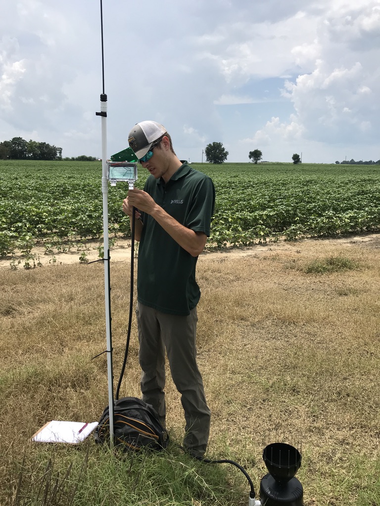 Our hardware engineer installs a Cellular Base Station.