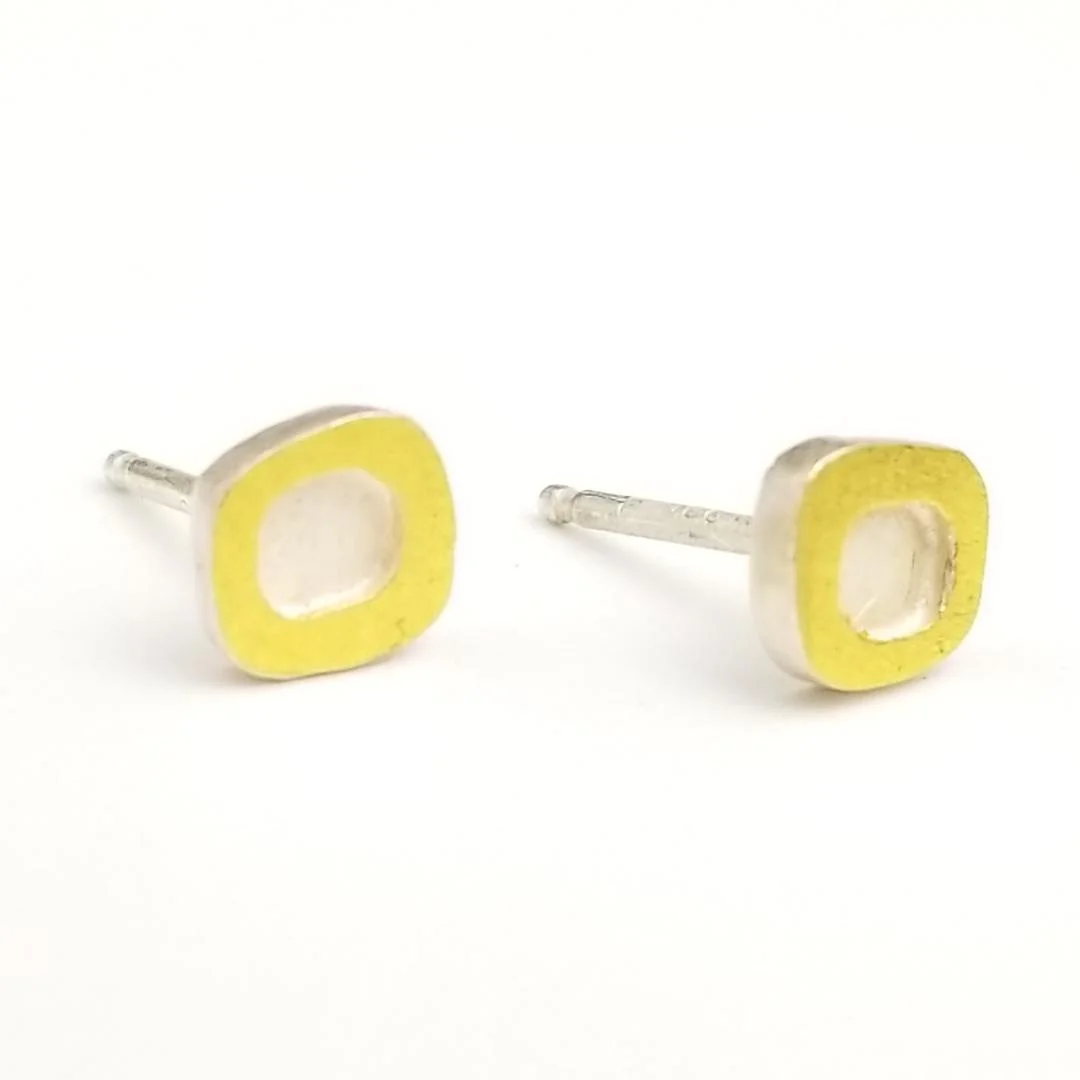 Sterling silver and gold studs