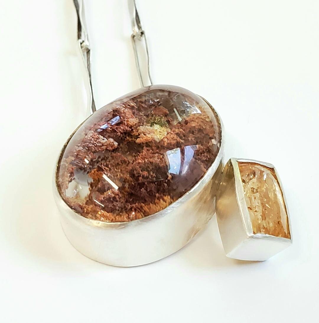 Imperial topaz and lodolite quartz necklace.