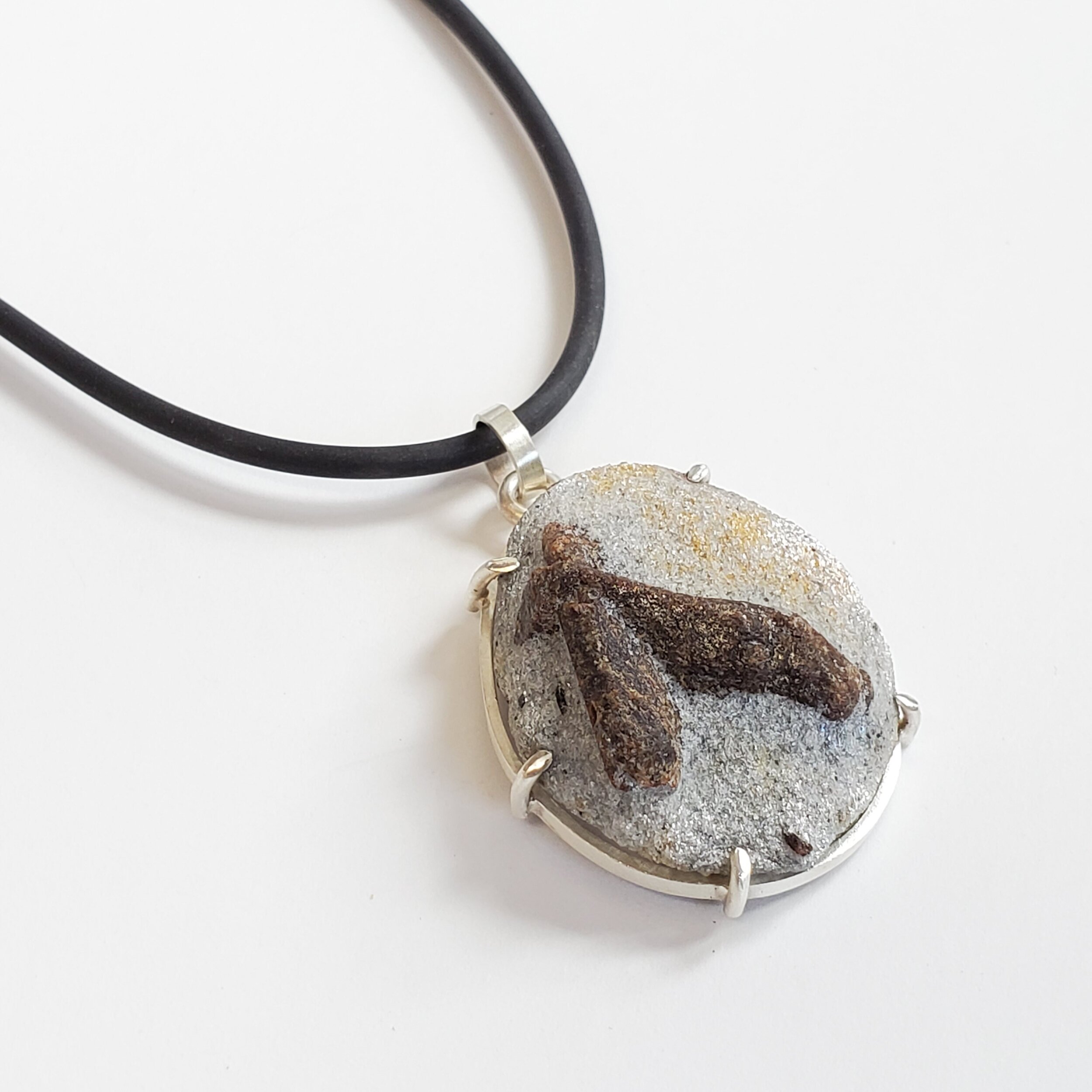 Staurolite specimen necklace.