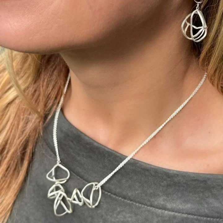 collar satelite solo plata clau peque.jpg