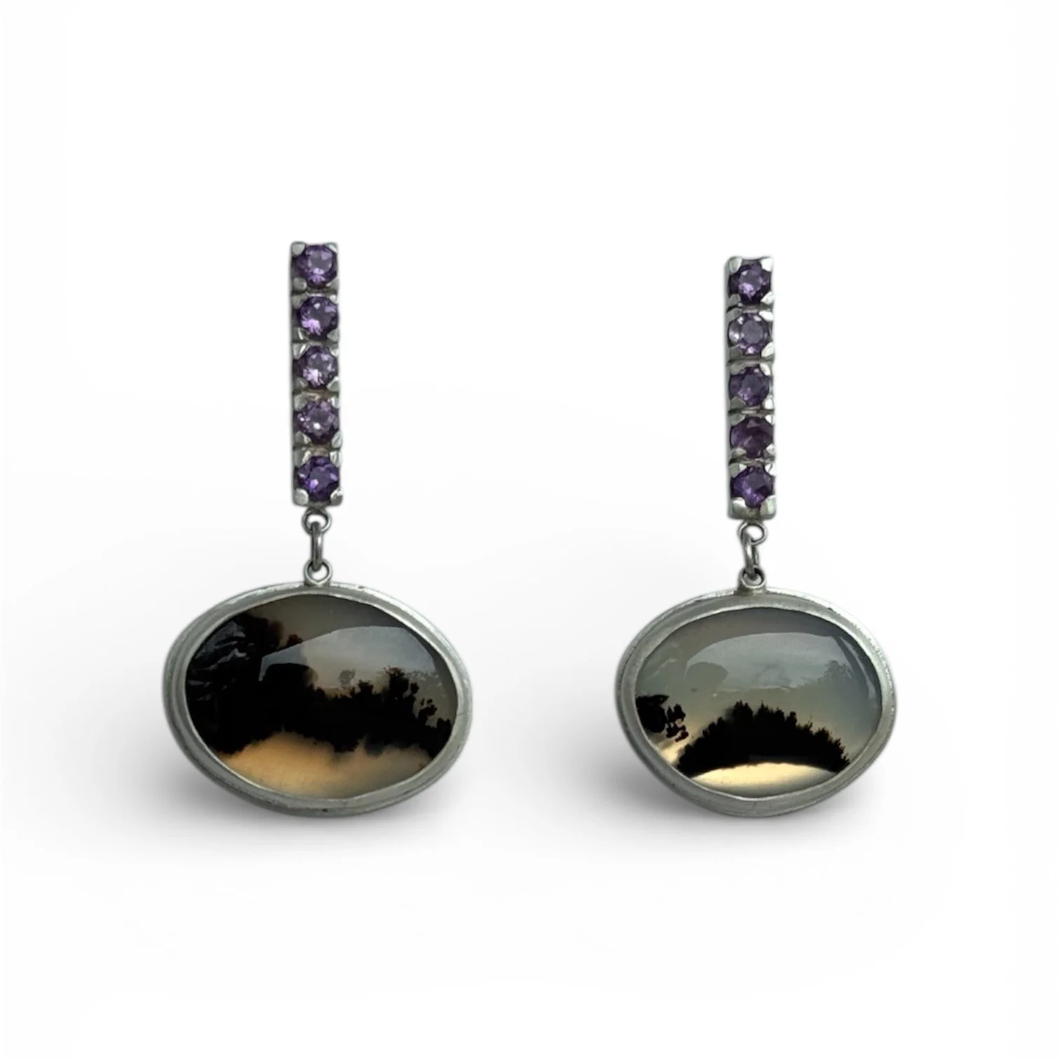 Moon stones earrings.