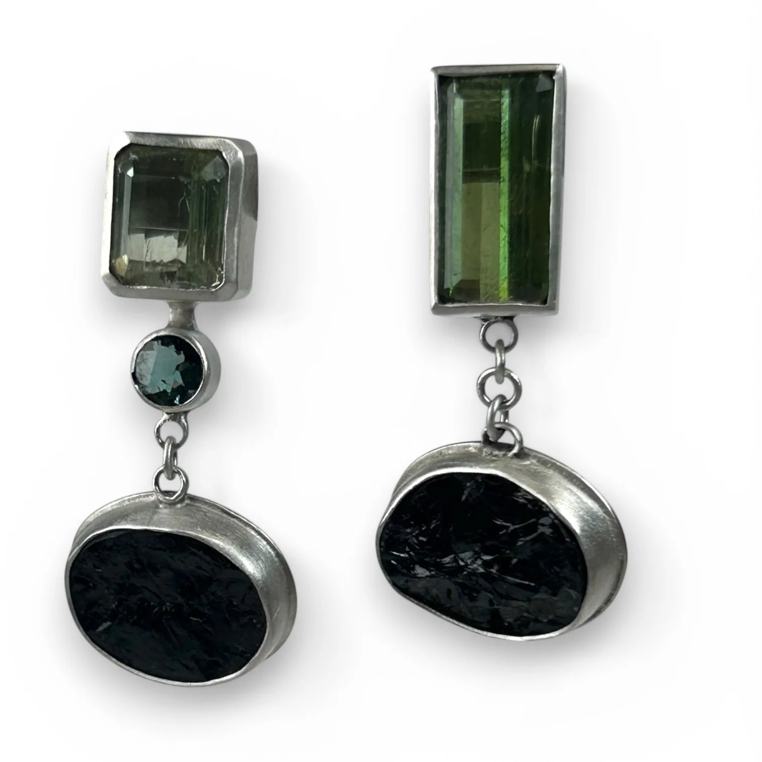 Black, green and blue tourmalines mismatching earrings.