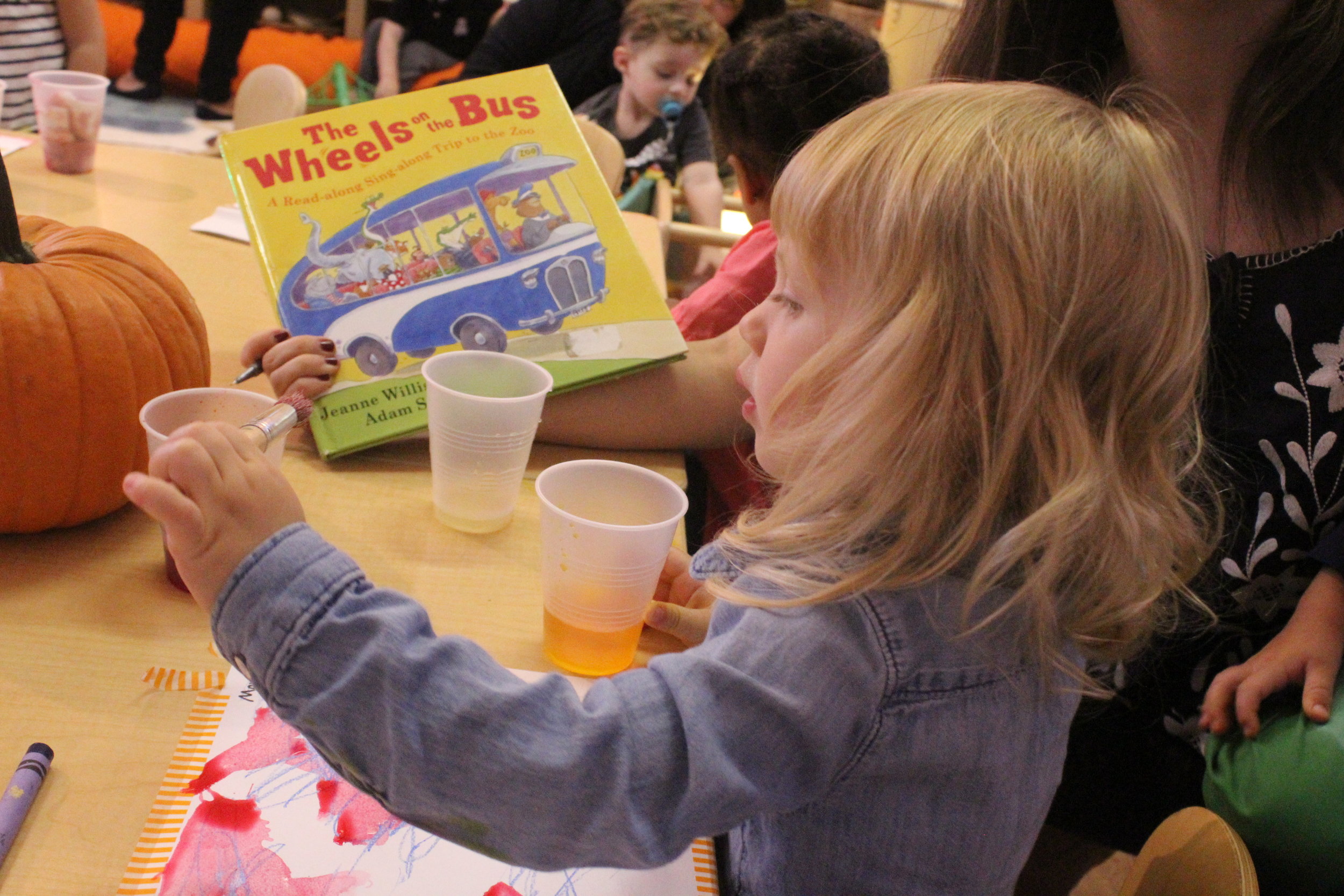  The children have been enjoying reading "Wheels on the Bus at the Zoo", so we read it for literacy this week and then each chose an animal and made our own puppets! 