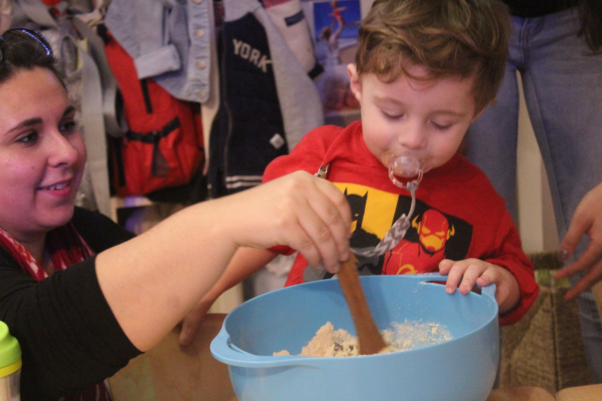  Max enjoying cooking this week with his mom! Max enjoyed sampling the chocolate chips from our recipe and working alongside his friend and mother! 