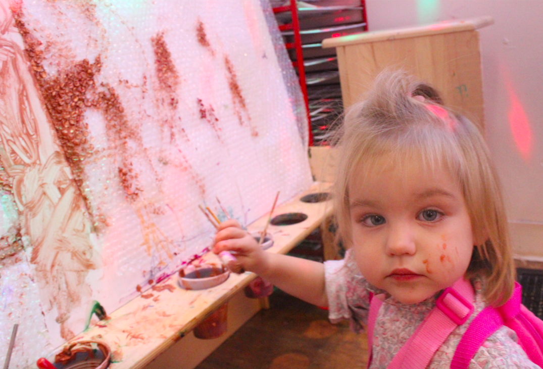  Charlotte painting at the easel! This week, she spent quite a bit of time here - and would excitedly try to invite her friends and teachers to paint alongside of her.&nbsp; 