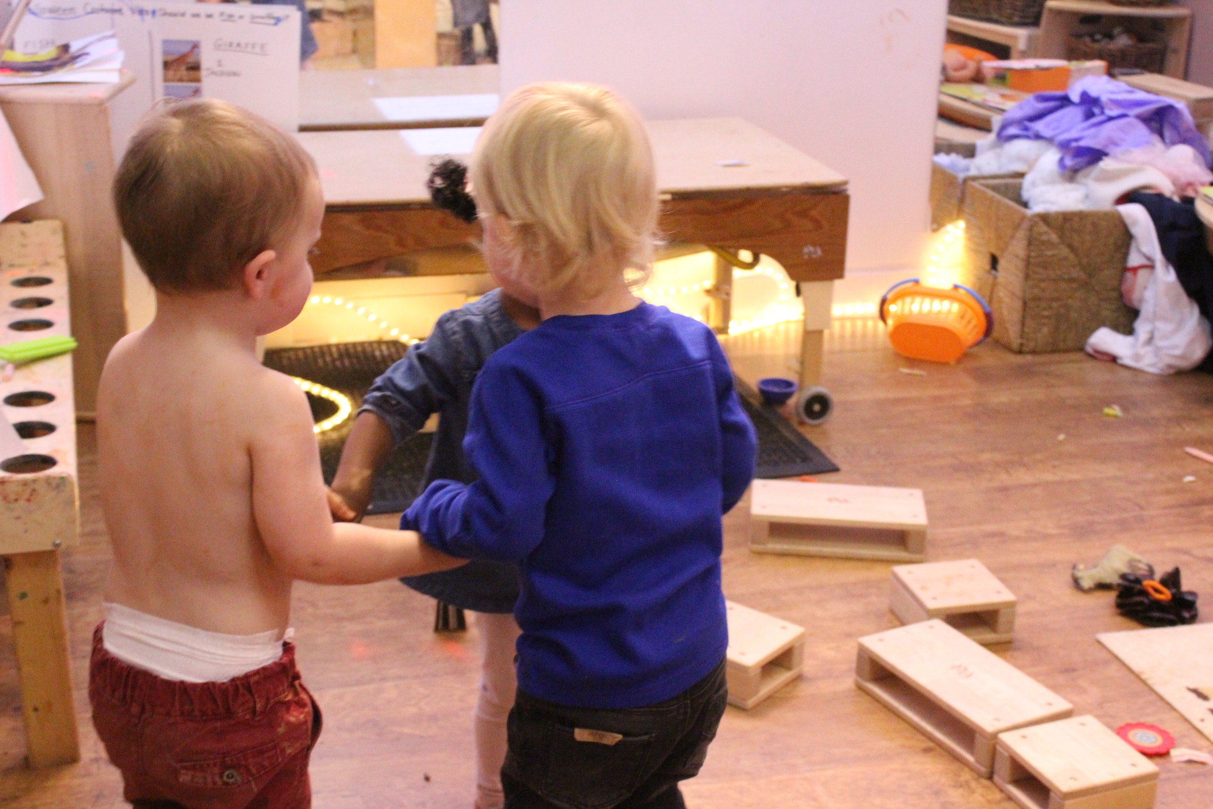  More dancing - We just can't get enough. These sort of games encourage cooperative play, language (while singing), and motor coordination. 