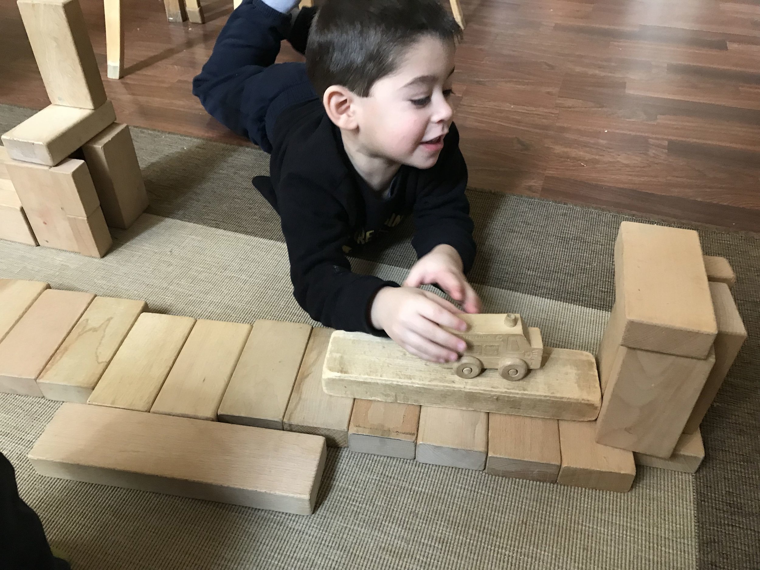  Dylan remembered that at the last workshop he made an airport.&nbsp; This time he made another airport, but with a pathway for cars to enter. 