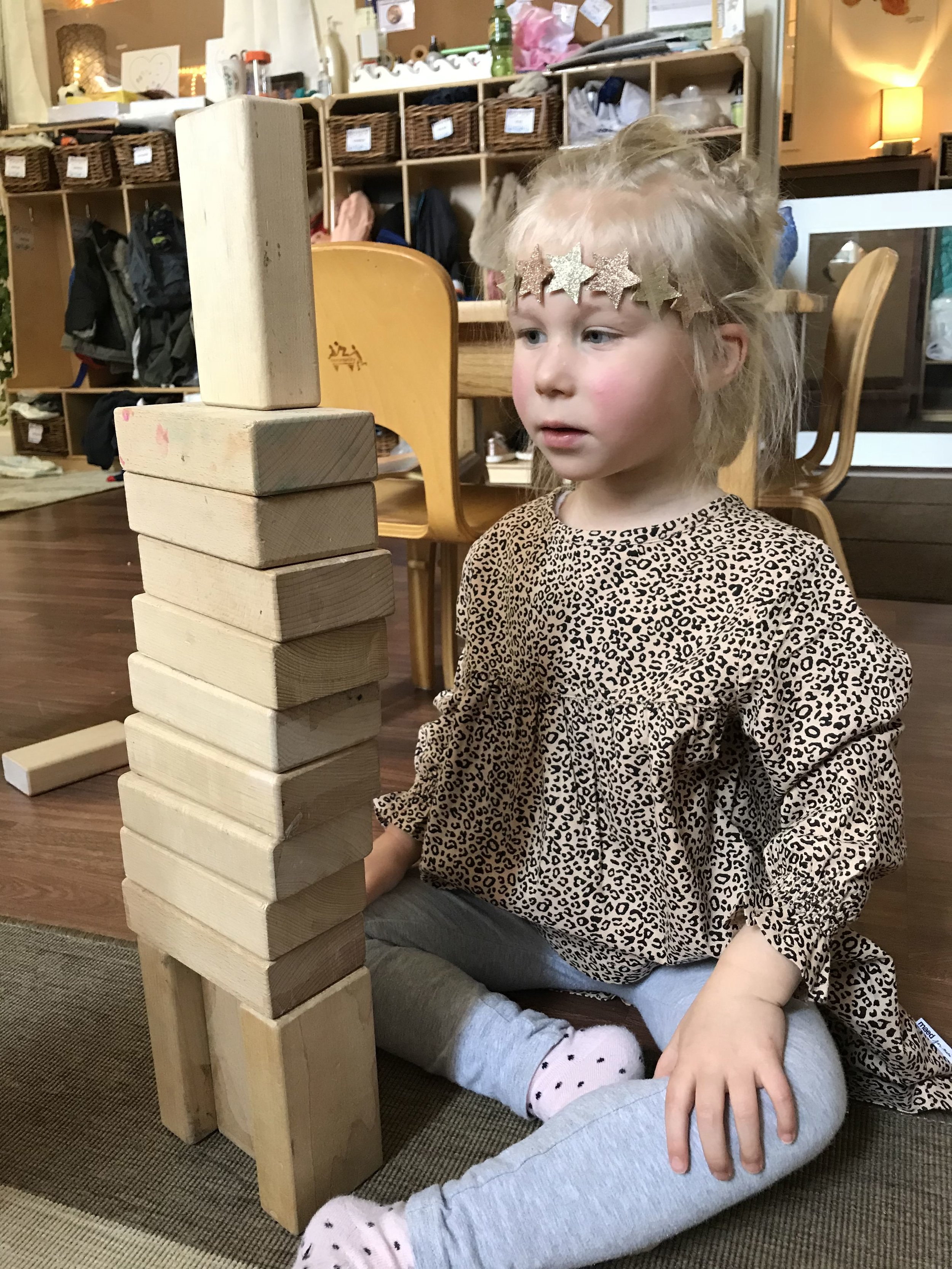  Charlie experimented with height by placing her blocks in different directions. 