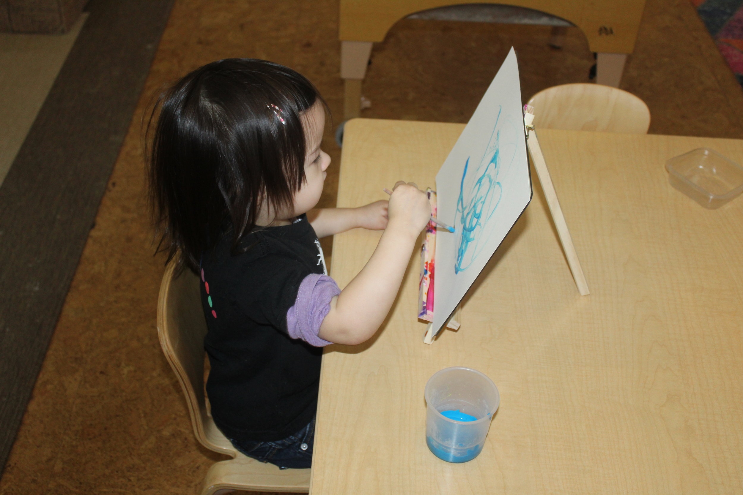  The children have been enjoying painting at the small easel.&nbsp;&nbsp;They are exploring and discovering new ways to move their arms to create different brushstrokes.&nbsp; I enjoy observing as they maneuver the paintbrush to create an art piece.&