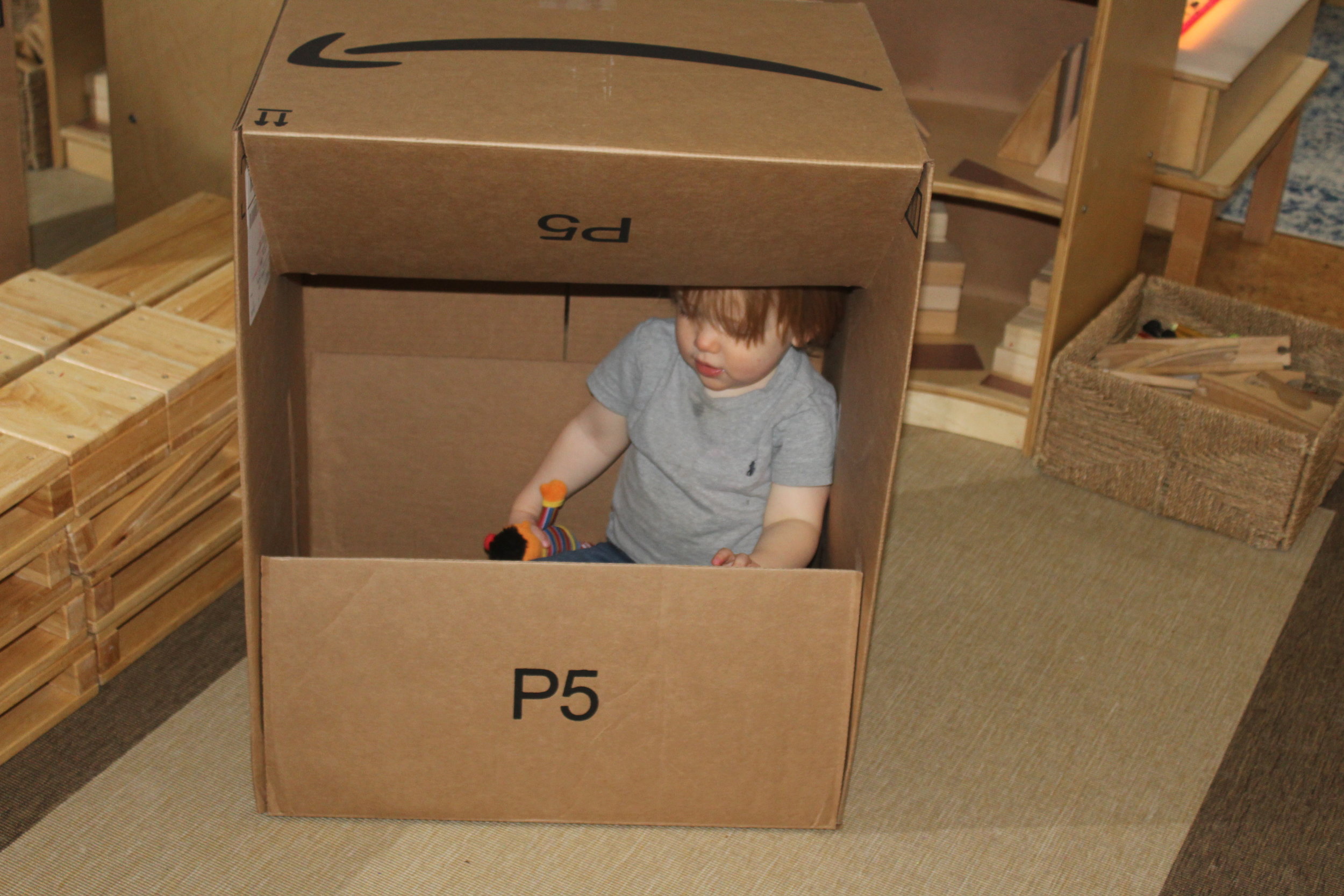  Toddlers are learning to understand their own space. &nbsp;Children are constantly testing their body; they crawl in, around, over, and under things. &nbsp;The first thing toddlers do when they see a cardboard box is to try to get in it. &nbsp;As th