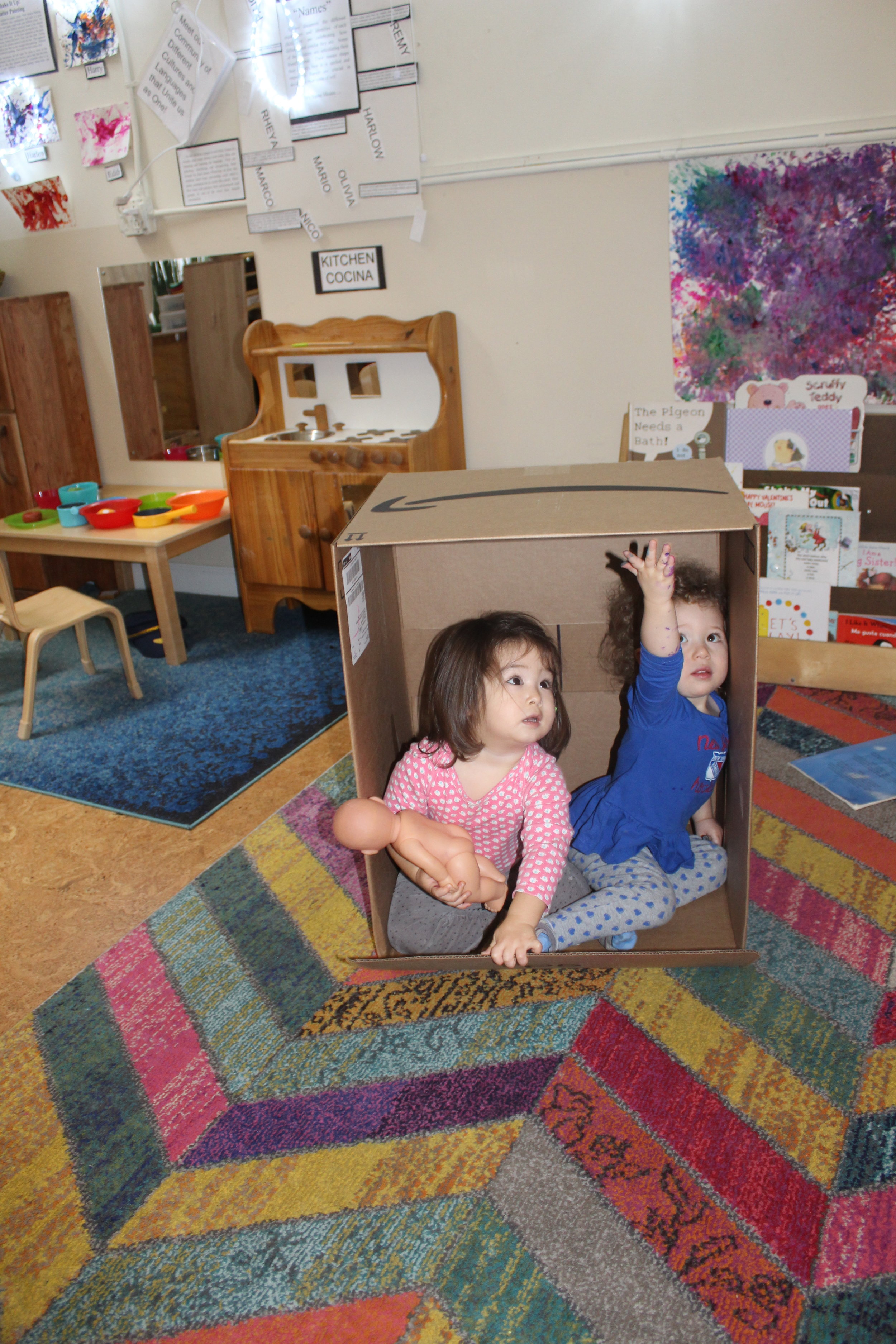  Remy looked curious and interested as she sat in the box. &nbsp;Soon, Rheya joined Remy in the box. &nbsp;The box appeared small for both children, but they both managed to create sufficient space. &nbsp; It seemed that the two of them had a lot of 