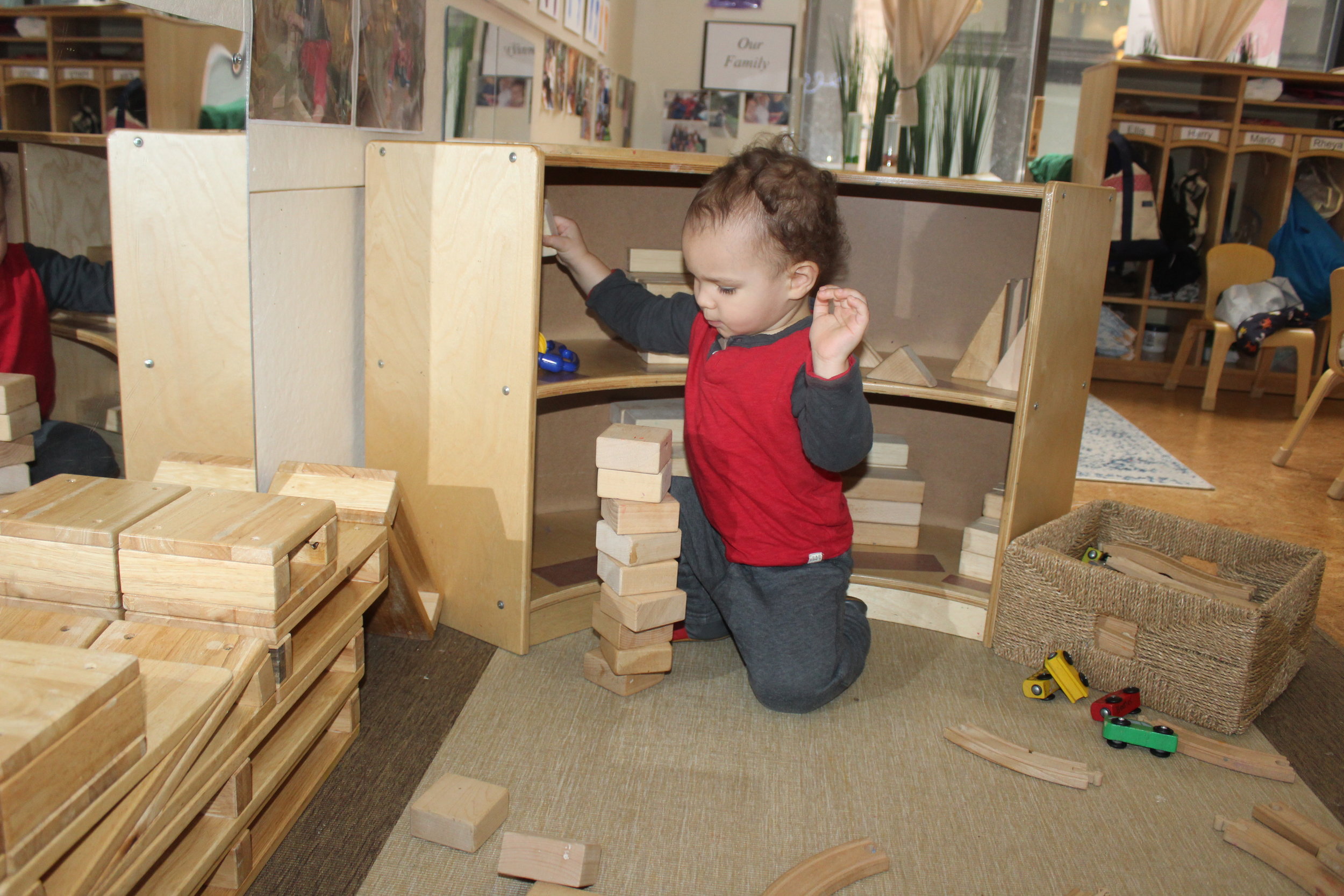  Ellis selected only square unit blocks to build his tower and then chose a triangle shape as his final block.&nbsp; He was careful and observant, as he was piling the squares. 