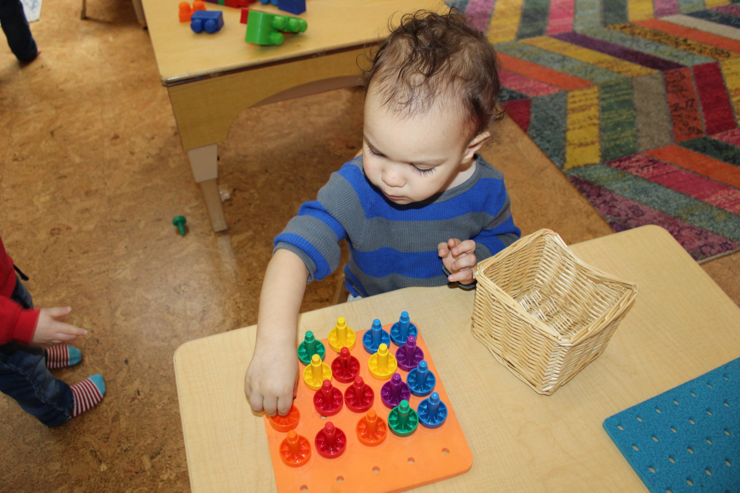   Teacher:  "Ellis, I am noticing that you are completing each row with different color pegs. What are you constructing?   Ellis : "A birthday cake!" 