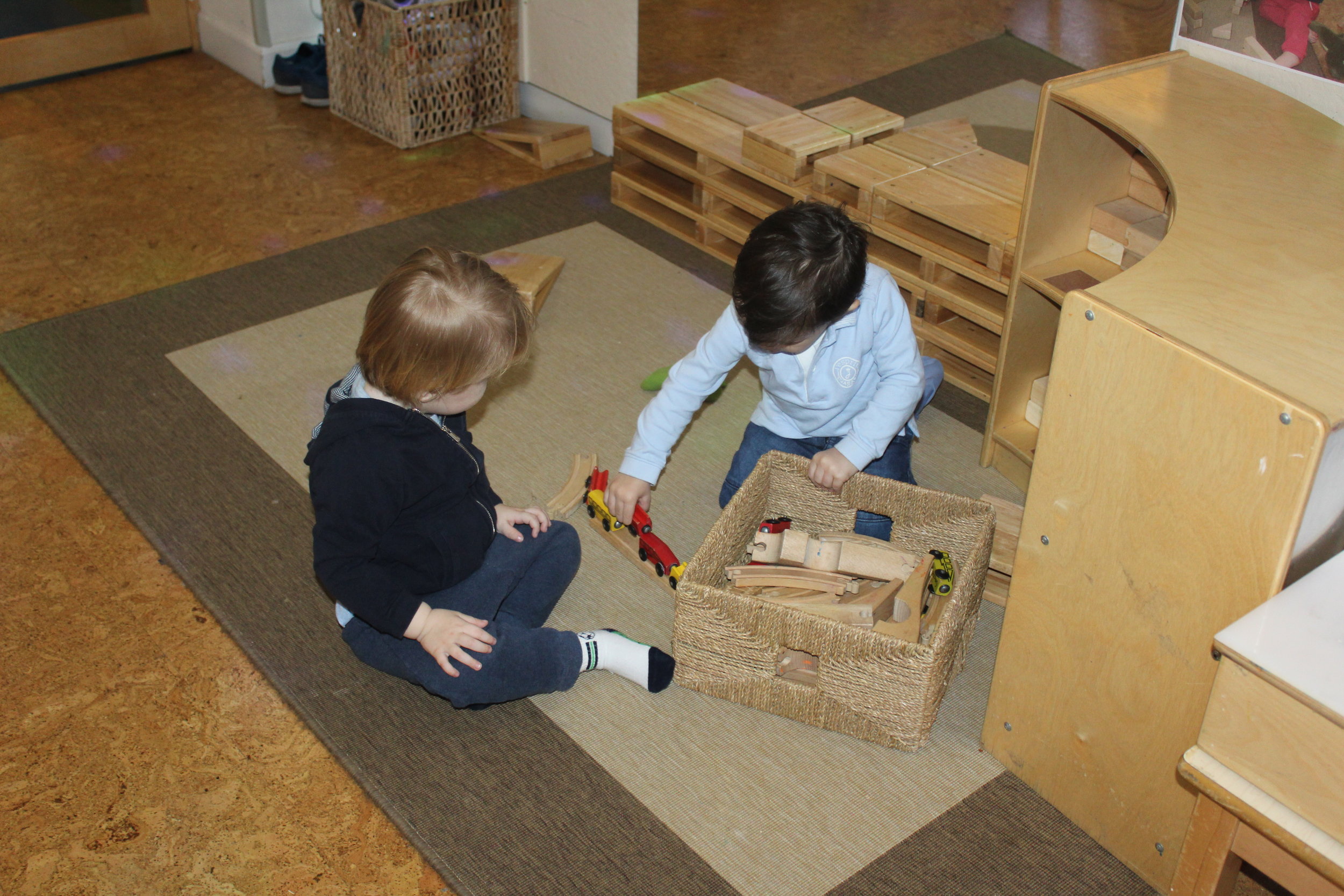  Children are learning to take turns, share toys and engage in play. 
