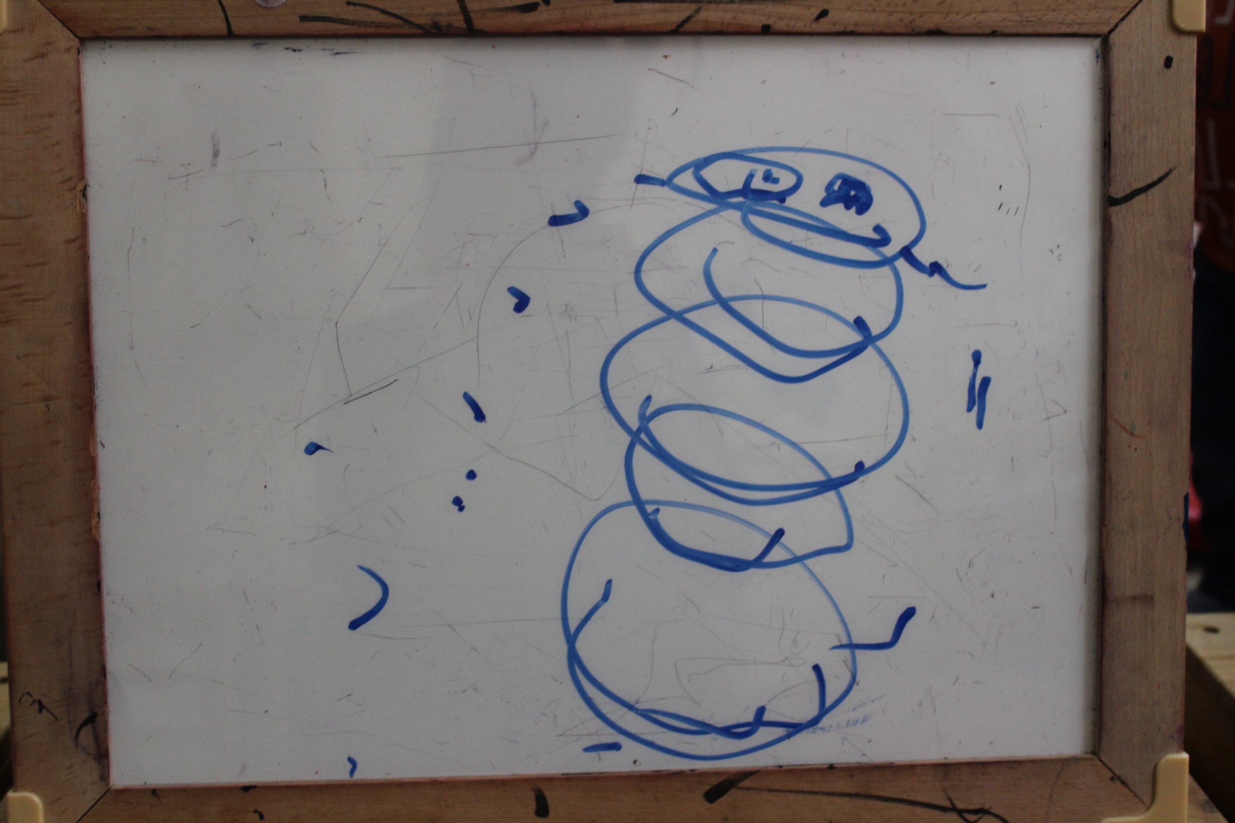 Harry drew a snowman on the erasable board! 