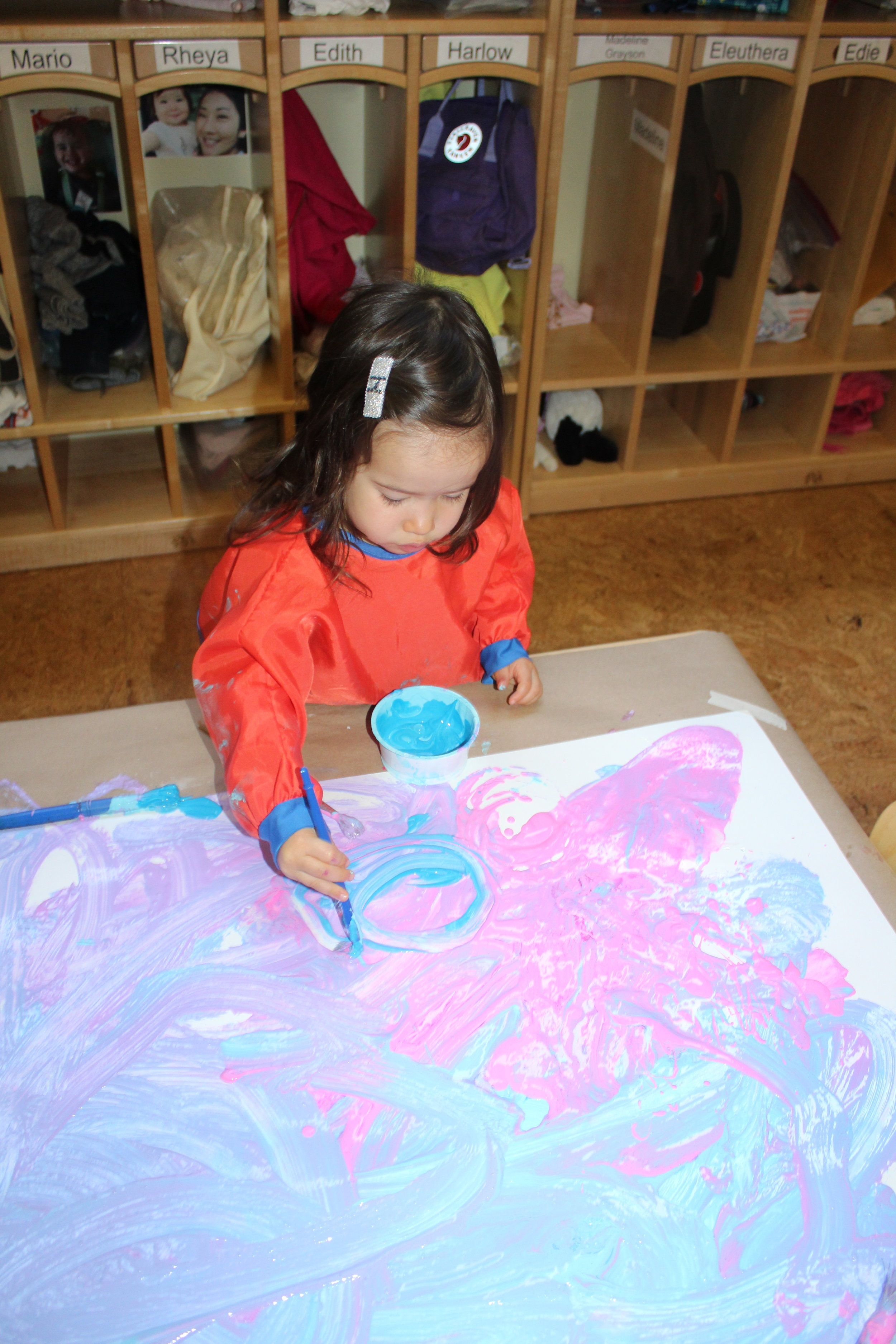  Painting provides texture and color exploration. It enables children to create and become curious as they paint. Combining colors and using a paintbrush or their hands to explore are elements that help them create and discover. As Ellie was mixing t