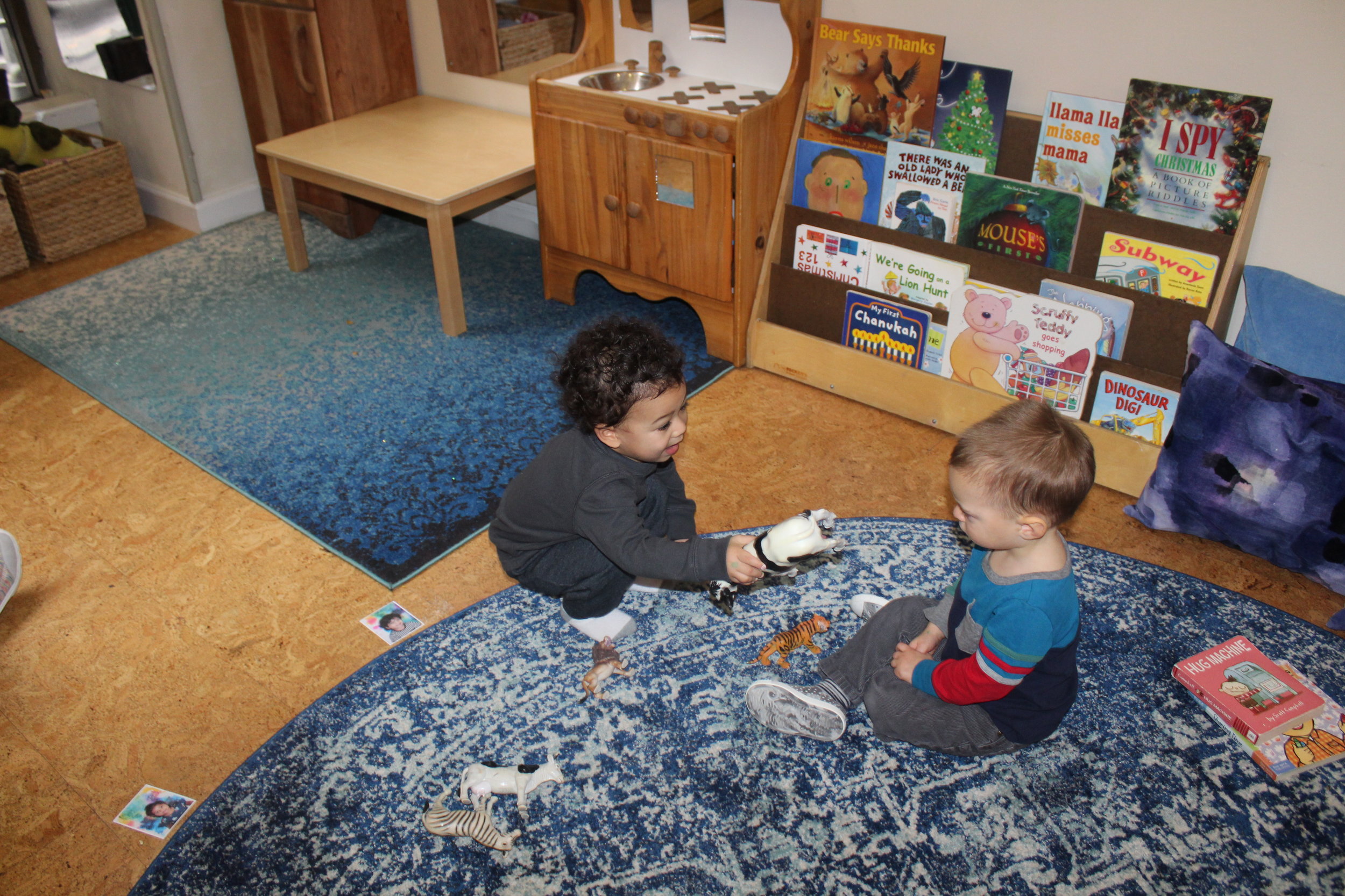  Leo appeared sad when his grandmother left after curriculum day.&nbsp; The teachers noticed Nathaniel giving Leo some of the animals from&nbsp;the manipulative center. It seemed Nathaniel was trying to make him feel better and it worked.&nbsp; They 