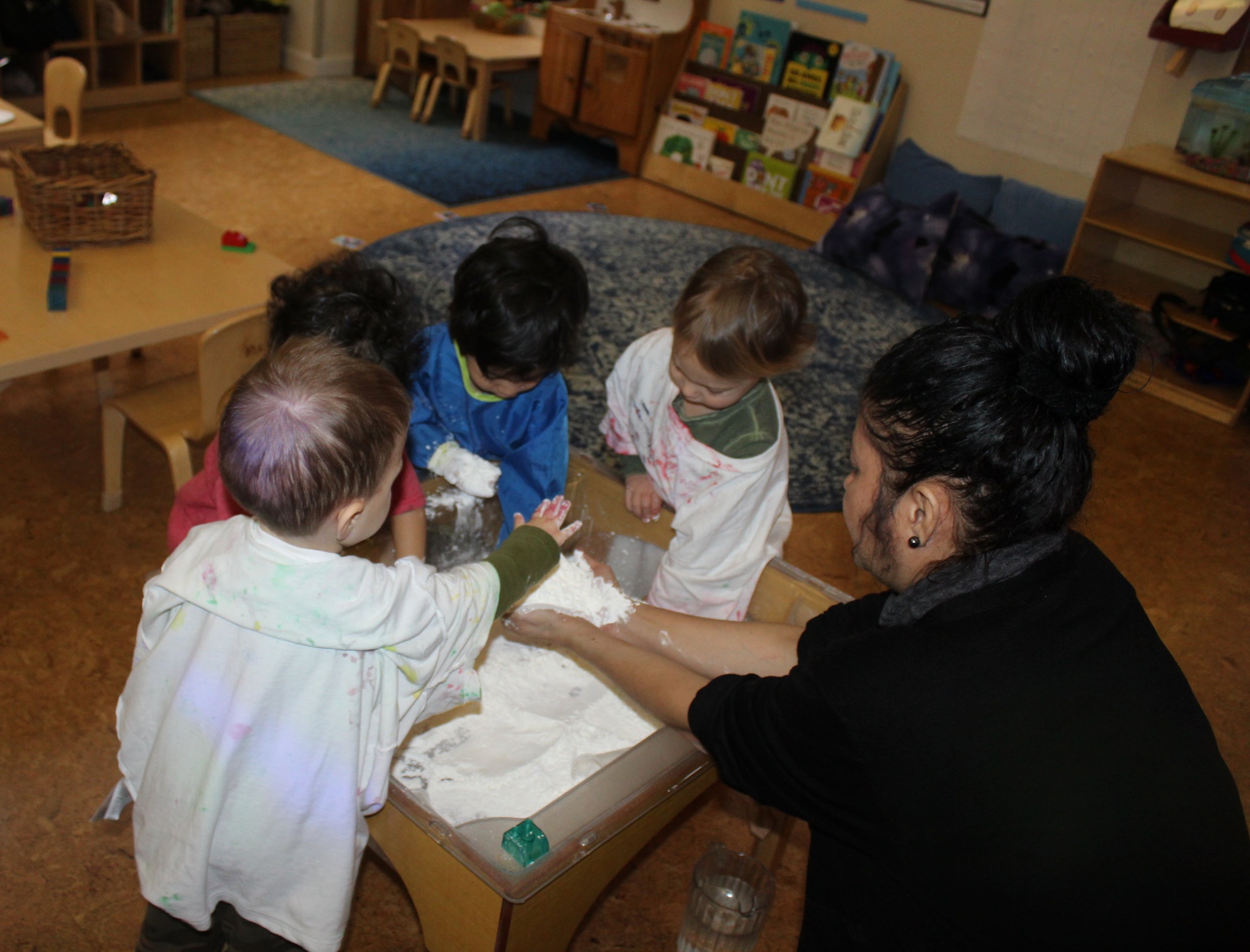  Some of the children helped me make Oobleck!&nbsp; The children touched and patted the powdery substance before adding the water.&nbsp; They each took a turn pouring the water as I mixed the two ingredients and then added some green watercolor.   