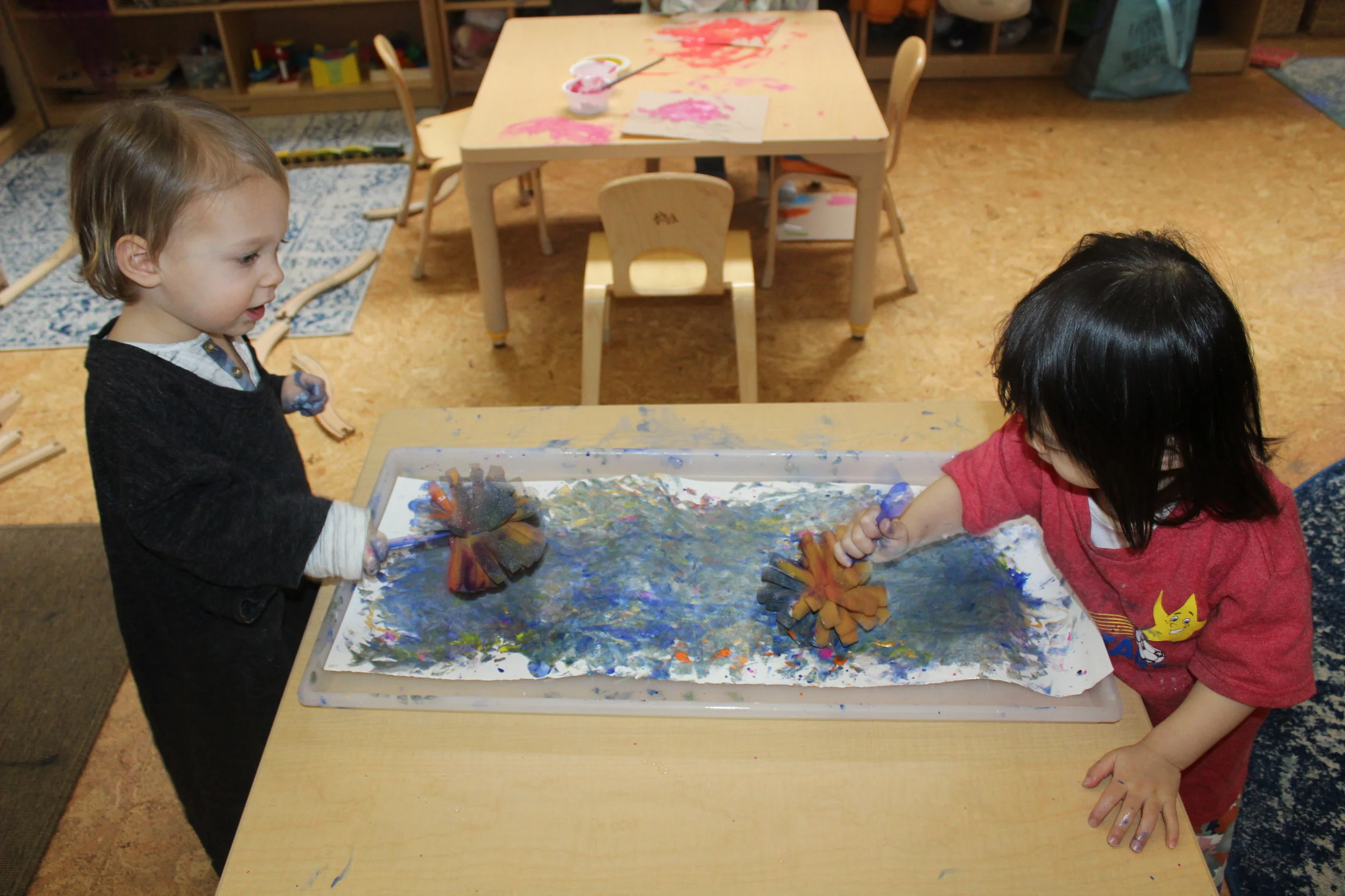  Nicole and Oliver&nbsp;were mixing colors using a sponge-like paintbrush.&nbsp;   
