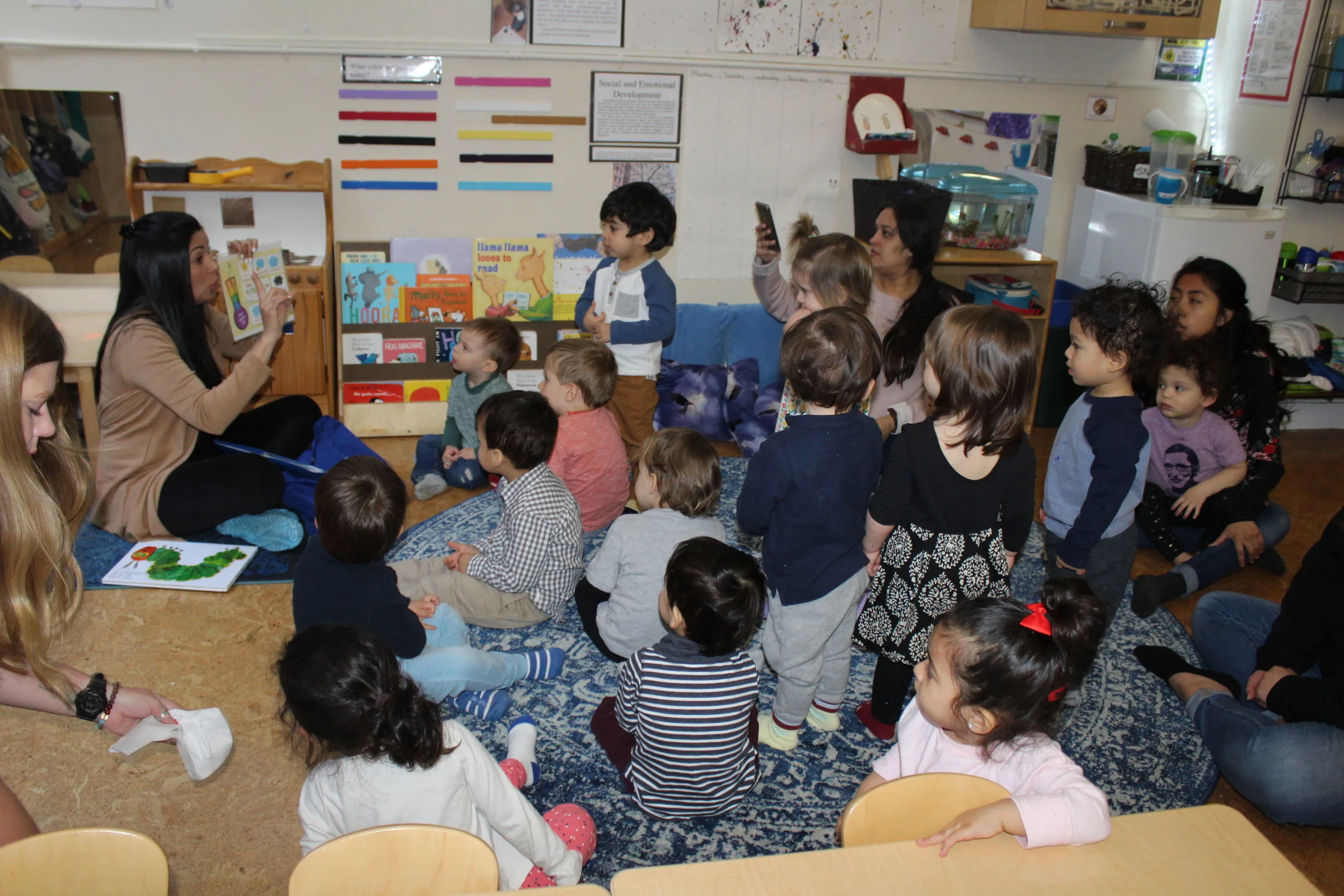  The Spanish Specialist sang the weather song and read The Hungry Caterpillar in Spanish.&nbsp; The children appeared curious as she read one of their favorite books they have listened to many times.&nbsp; &nbsp; &nbsp;&nbsp;   