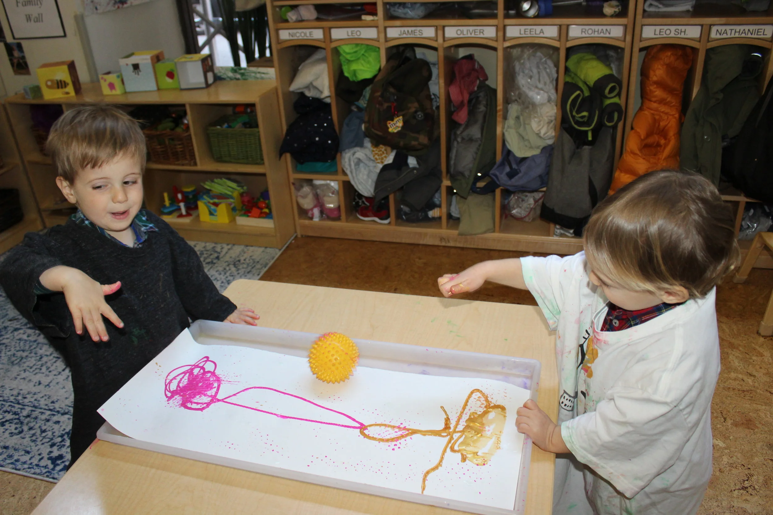  We are revisiting, Ball Painting with different partners. Leo and Oliver seemed to enjoy passing the ball to each other. The children are developing their language skills, and as they pass the ball to each other, they articulated what they saw in th
