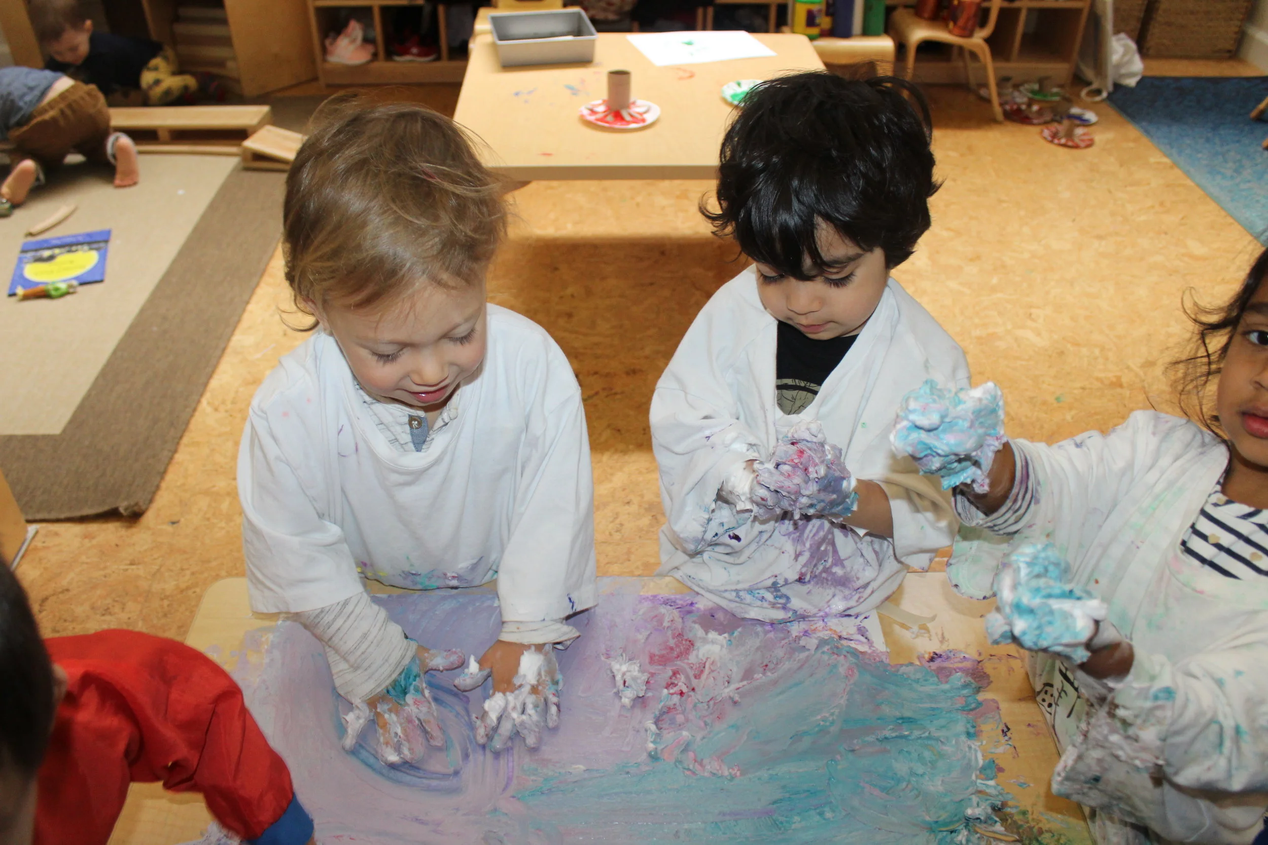  The children explored finger paint and shaving cream.  It also a great sensory experience!   