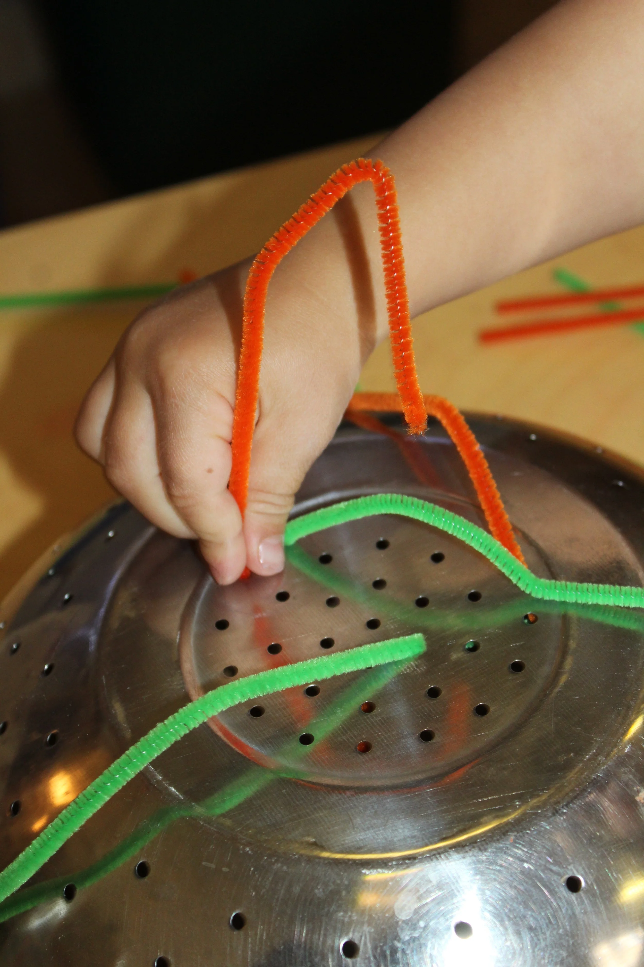  The children have always enjoyed interacting with the Colander and Pipe Cleaner activity. It improves, fine motor skills, concentration, and focus as they insert the pipe cleaner into the hole.   