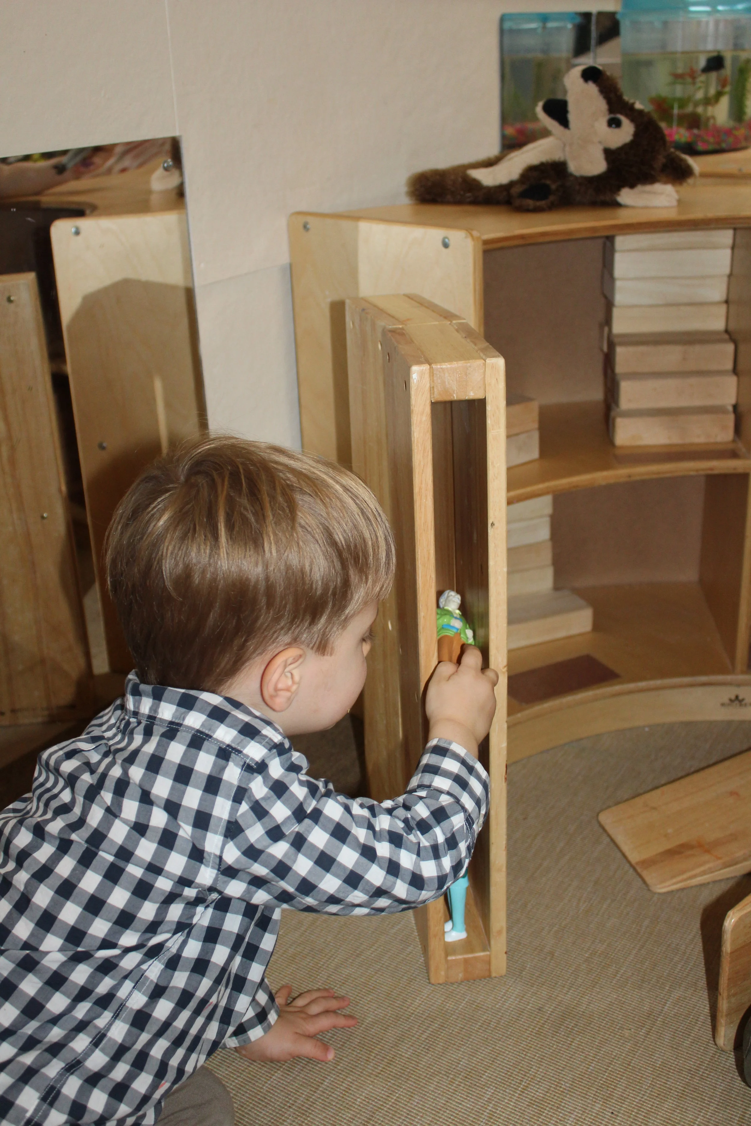  Teacher: I noticed you put some hollow blocks one on top of the other.  What are you building, Leo?  Leo: “It’s a building. I am trying to make it higher.”  Teacher: "Who lives in the building?"​  Leo: "Sister, mommy, daddy, and me. That's my family