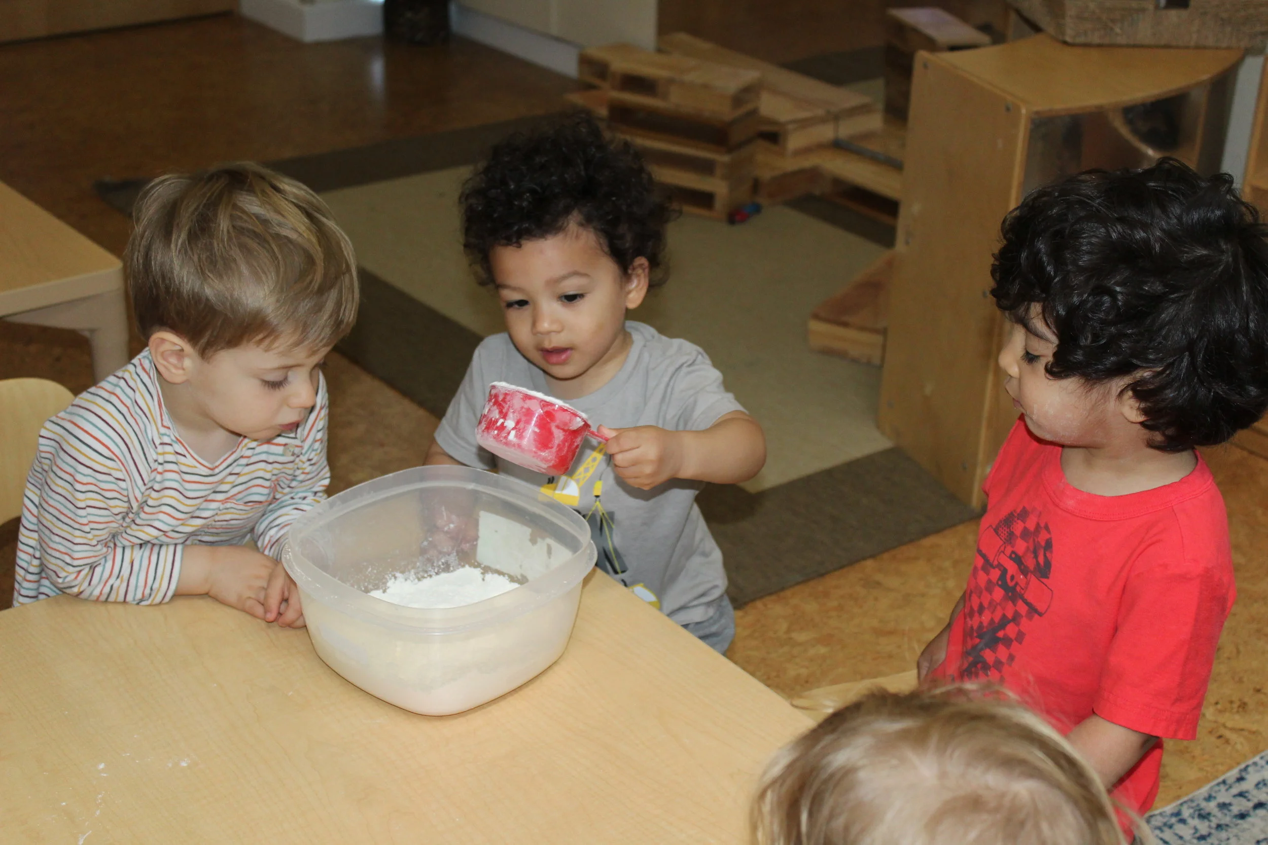  The children collaborated with the teacher in making Salt Dough. Only two ingredients, salt, and flour were needed. As the teacher kneaded the dough, the children appeared curious, and some expressed the words oil and water. They recalled the other 