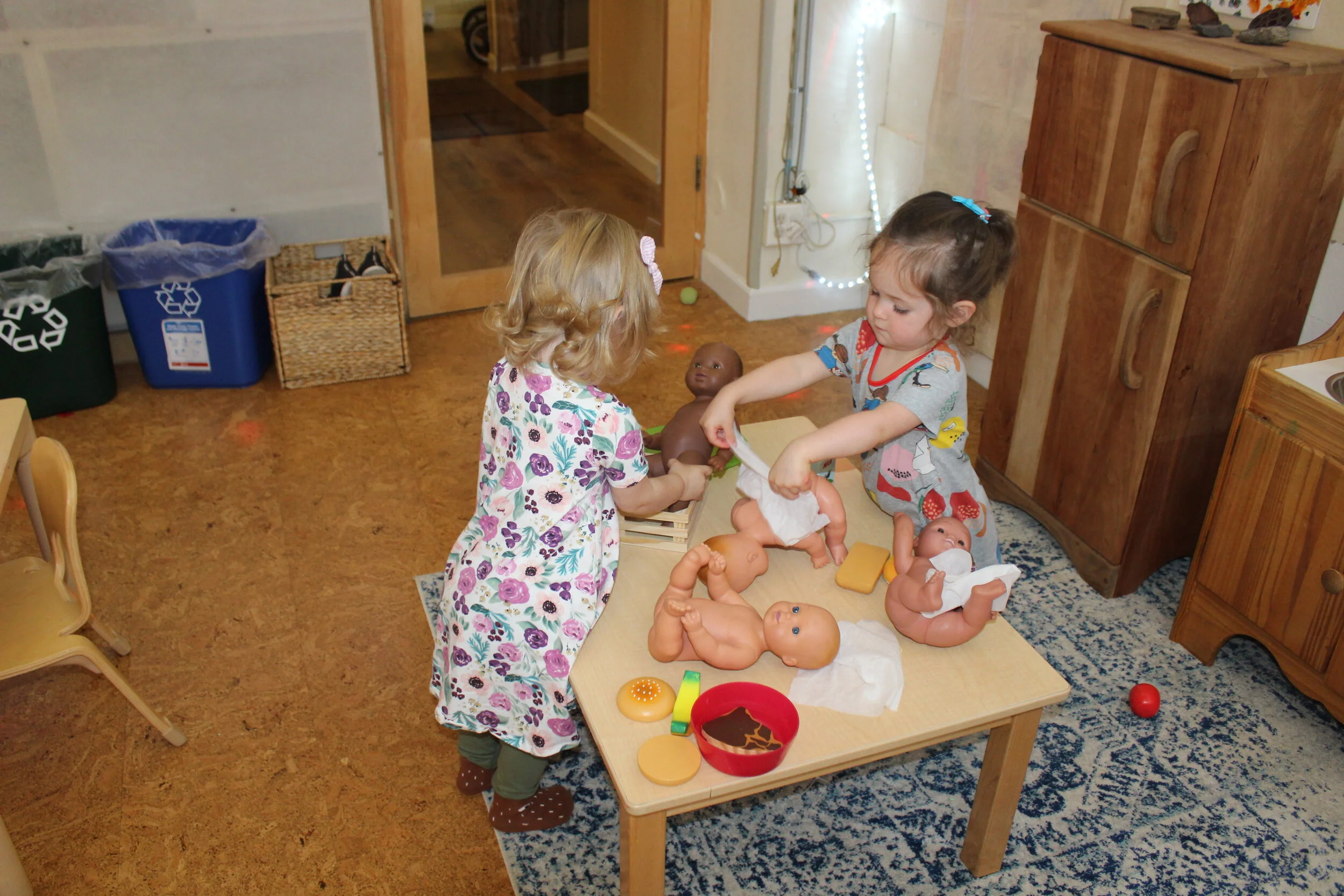   Annabelle:  “Baby has, poo pee!”  Then she wipes and said , “Baby all clean!”   Teagan : "Baby has to go potty!" Teagan used one of the crates to represent the potty. 