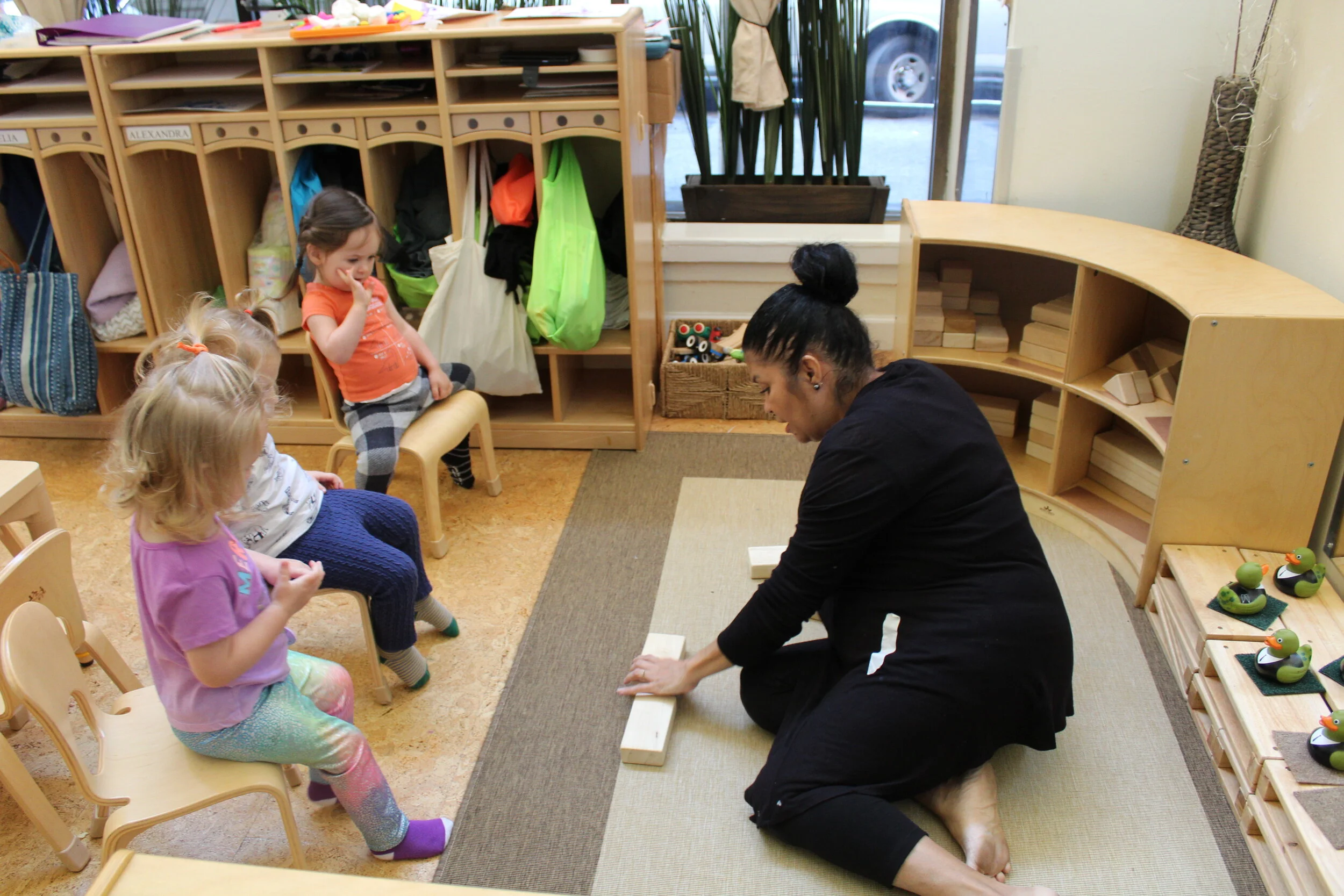   Using unit blocks to measure our height!   Their height is part of their identity. As they develop, they grow taller, and they each grow differently. We began measuring their height using unit blocks. Each child will lie in a horizontal position, a