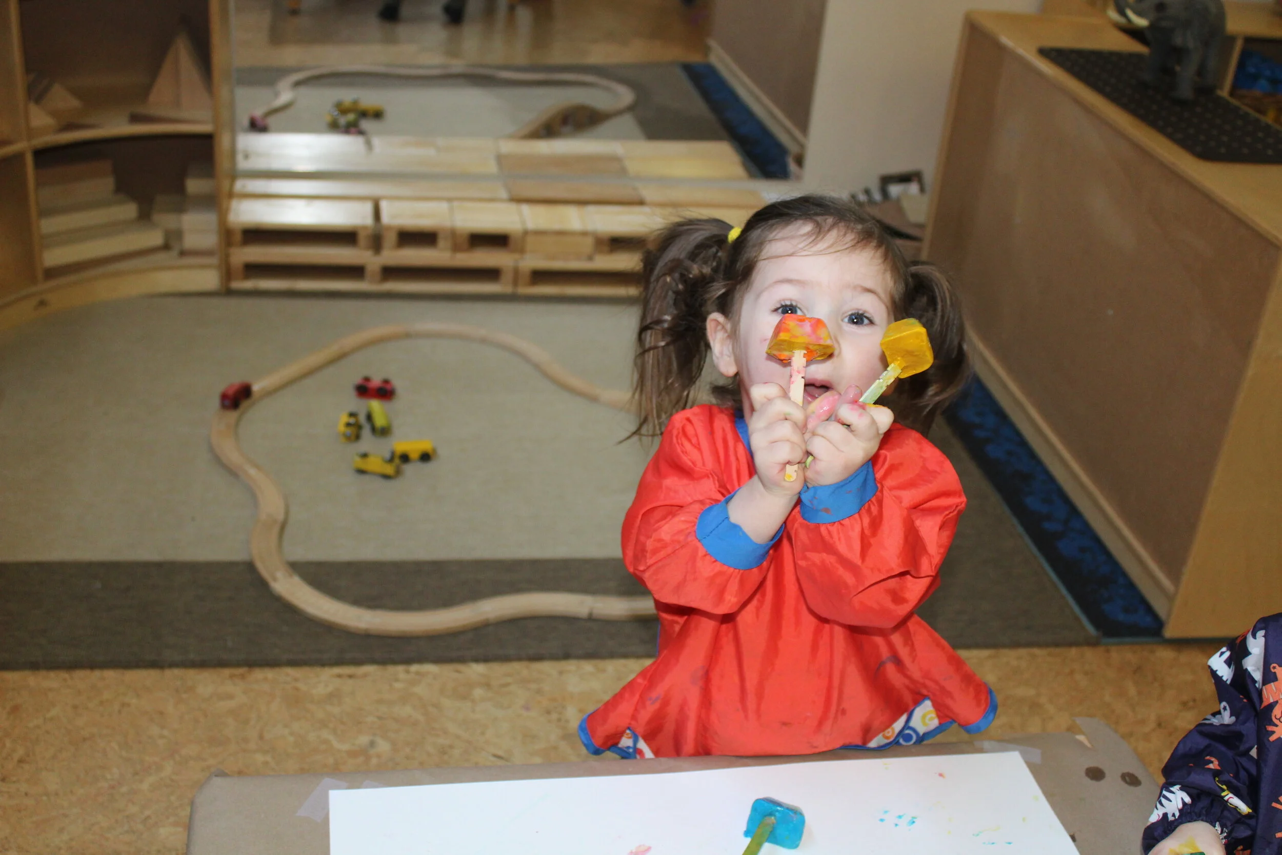  Ice painting is a combination of science and sensory exploration. We poured some tempera paint in an ice cube tray with Popsicle Sticks and allowed it to freeze overnight. As we removed the ice cube paint for the children to explore, we observed the