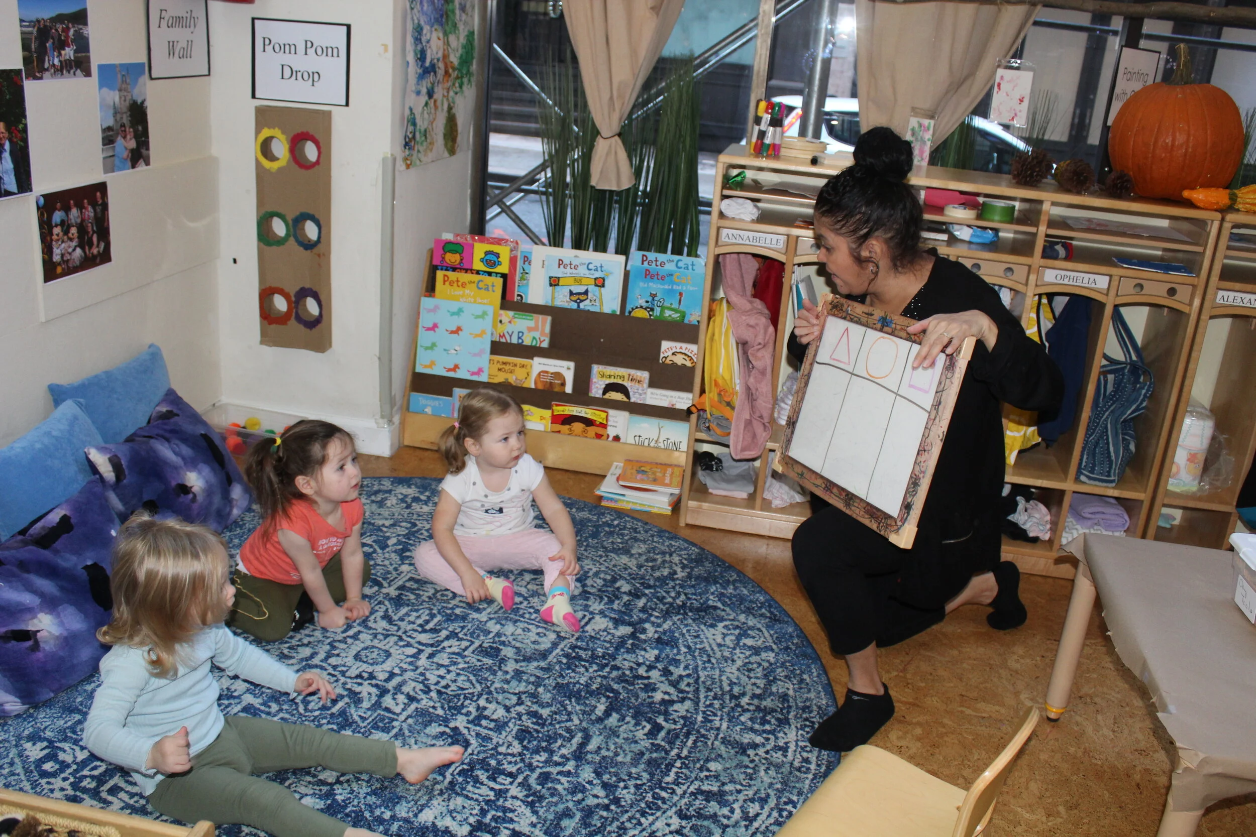  As a class community, the children were asked to select the shape they would like the eyes, nose, and mouth to be for our classroom Jack-o-lantern. The teachers and children are going to vote on the shapes. There are three different shapes to choose