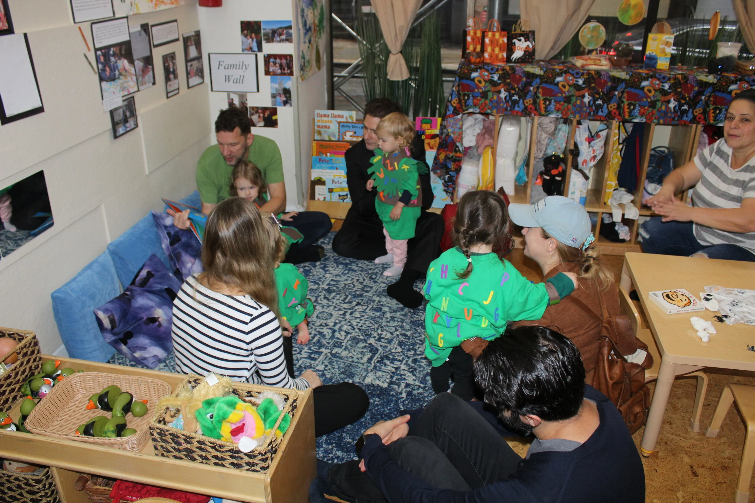  Some of the parents volunteered to read as the children listened. It was beautiful to see the parents gathered on this fun occasion with the children. 