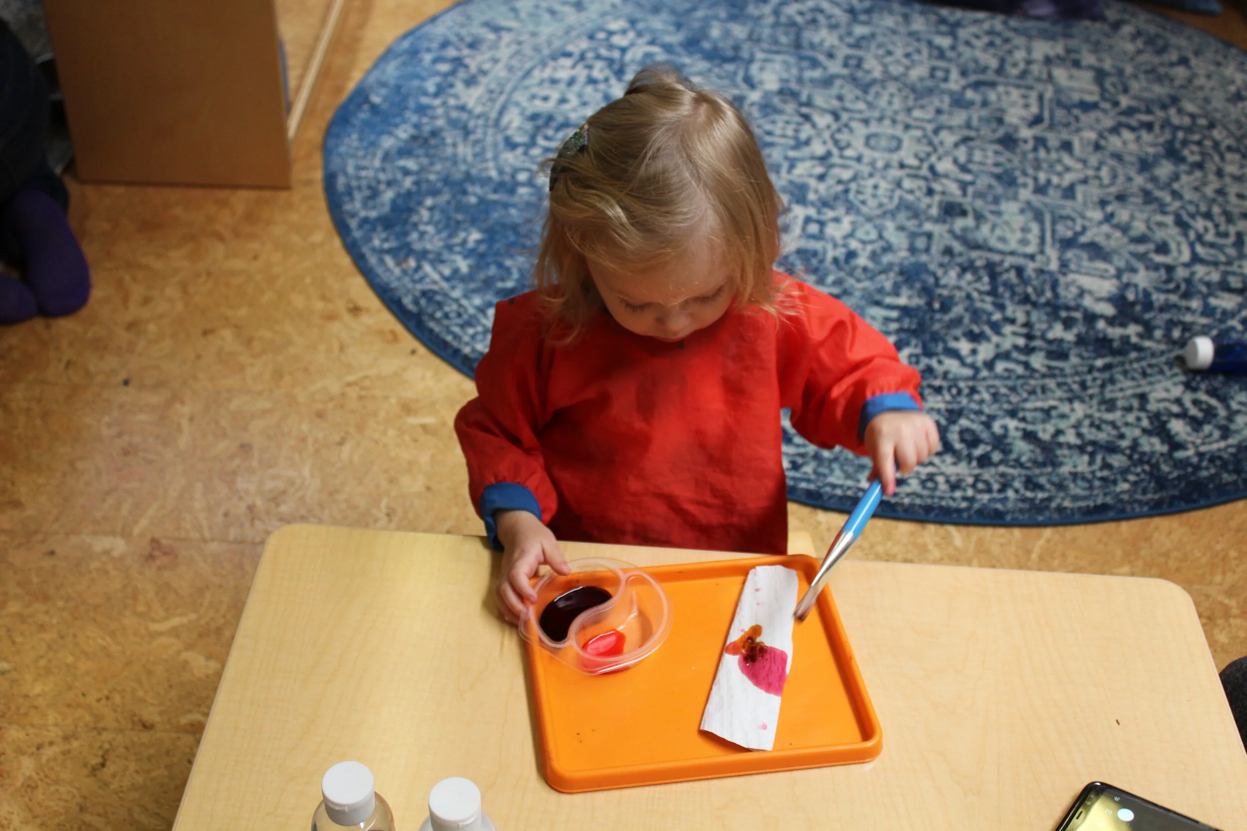   Watercolor Paper Towel Art Activity!     Painting on paper towel promotes a new way to investigate how watercolor spreads differently than ordinary tempera paint. The children independently chose two or three different colors. They observed how qui