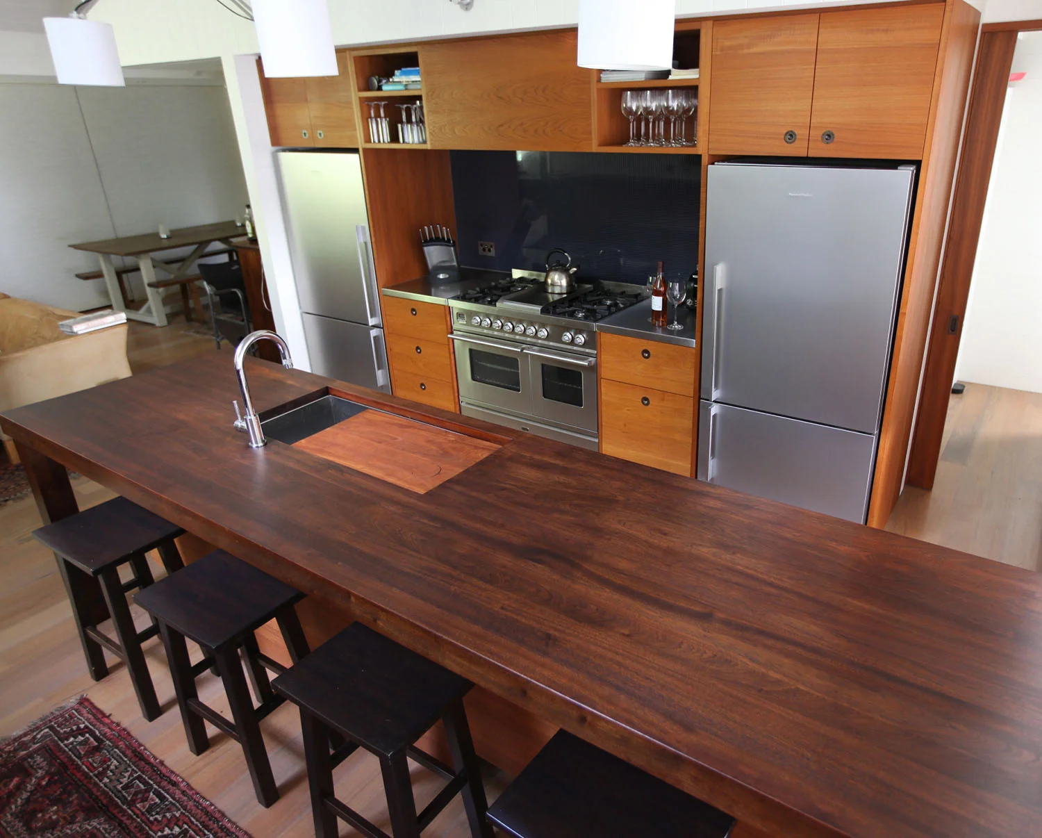 Oiled solid teak fronts, solid mahogony island and stainless benchtop