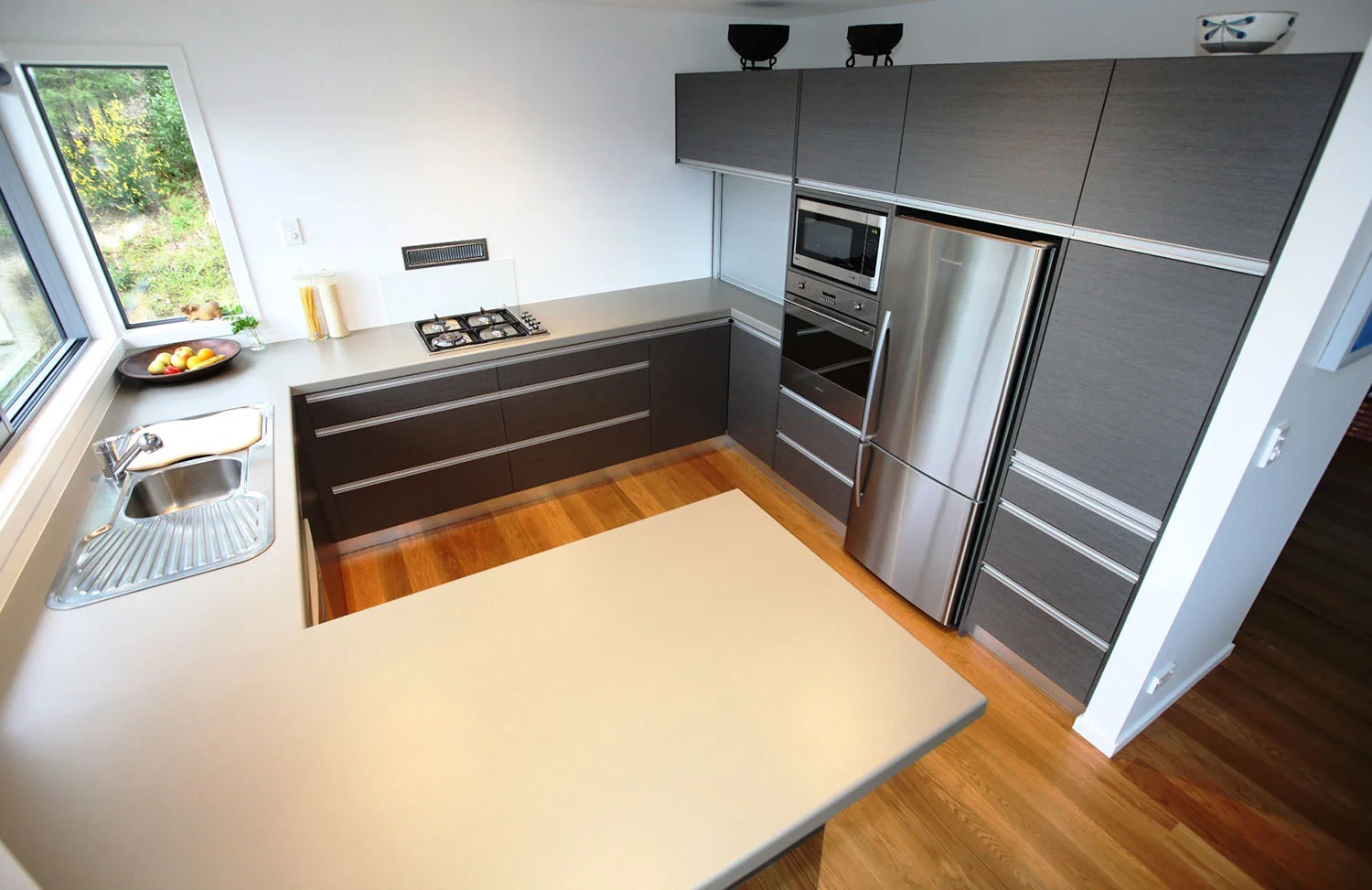 Ash pinstripe fronts with silver shadow benchtop