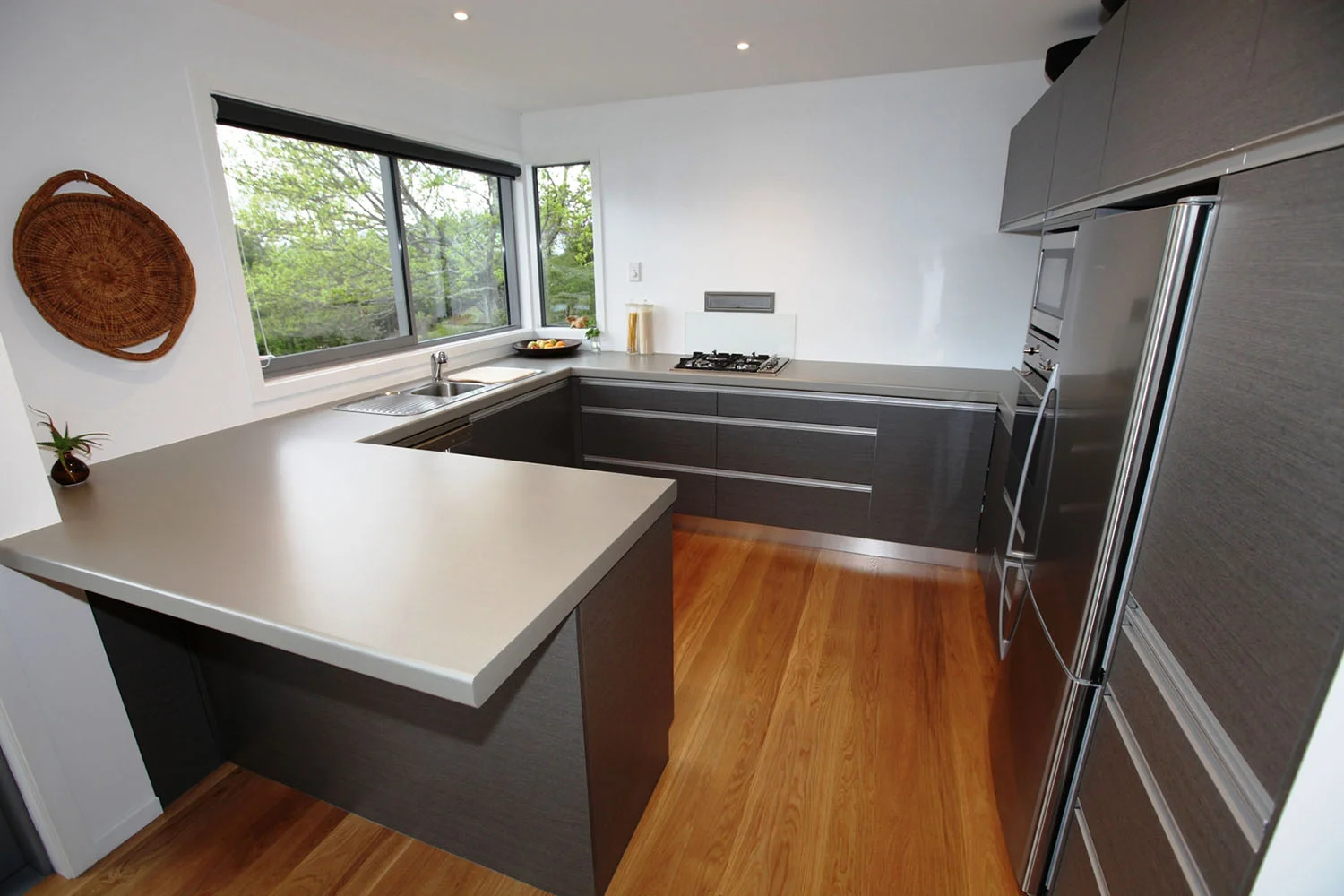 Ash pinstripe fronts with silver shadow benchtop