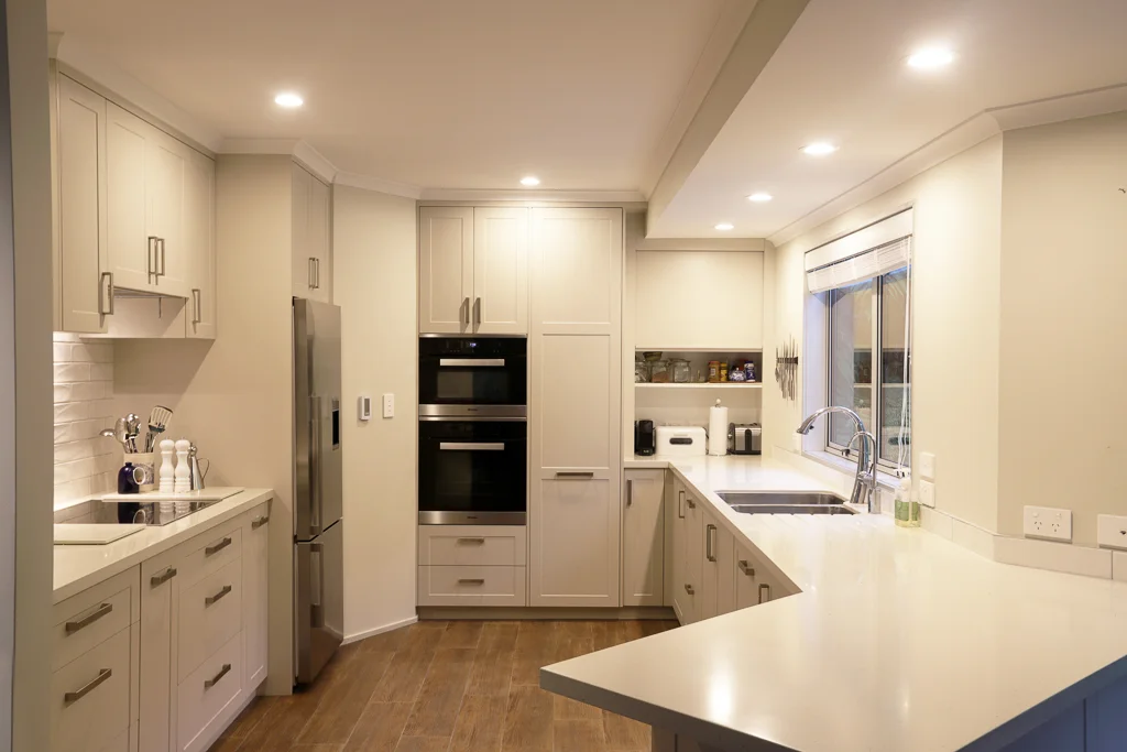 Classic kitchen with thermo-formed fronts and acrylic benchop